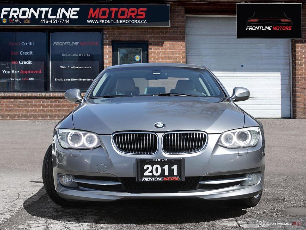 2011 BMW 3 Series 2dr Cpe 328i xDrive AWD Photo