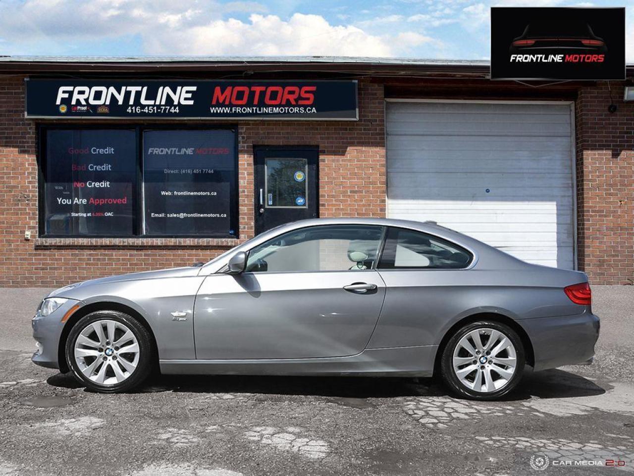 2011 BMW 3 Series 2dr Cpe 328i xDrive AWD Photo