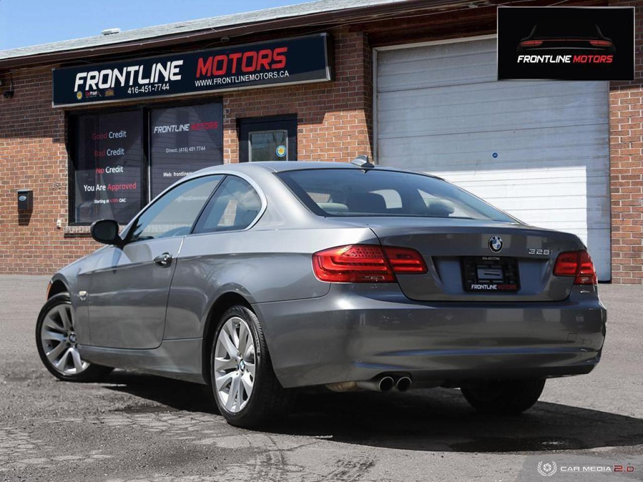 2011 BMW 3 Series 2dr Cpe 328i xDrive AWD Photo