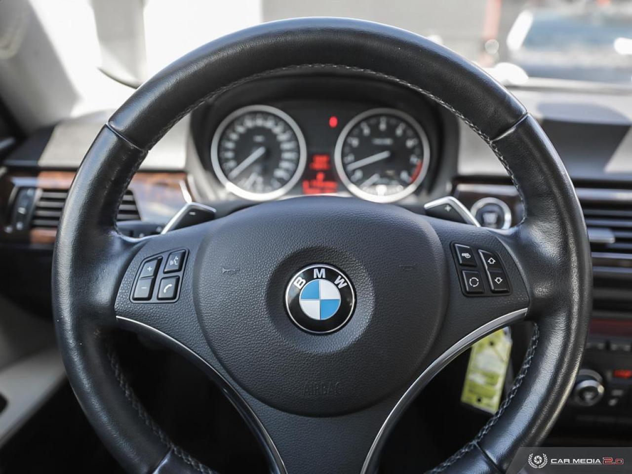 2011 BMW 3 Series 2dr Cpe 328i xDrive AWD Photo