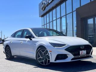 <b>Low Mileage, Head Up Display,  Leather Seats,  Sunroof,  Cooled Seats,  Premium Audio!</b><br> <br>  Compare at $32950 - Our Price is just $31990! <br> <br>   Ready for your urban commutes and family tasks, this 2022 Sonata delivers exceptional performance, with a well-built interior and tons of space. This  2022 Hyundai Sonata is fresh on our lot in Midland. <br> <br>Sonata continues to raise the bar in the midsize sedan segment with the ubiquitous Sonata, and this 2022 iteration is no exception. Engineered to deliver a smooth and comfortable ride with premium interior build materials and a refined power train, occupants are cocooned in tranquility with every drive. Exceptional reliability and great value ensure that this 2022 Sonata stays on top in the ever-competitive sedan segment.This low mileage  sedan has just 19,280 kms. Its  hyper white in colour  . It has an automatic transmission and is powered by a  290HP 2.5L 4 Cylinder Engine. <br> <br> Our Sonatas trim level is N-Line. With brutal drivetrain upgrades and sport tuned suspension this N Line Sonata is more than a style upgrade, but if you like style this N Line Sonata has it with a sunroof, exclusive wheels, black trim, N Line logos thoughout, and red accent stitching on Nappa leather sport seats. The tech upgrades for this aggressive Sonata include a heads up display, a 12 speaker Bose Premium Audio System, and a 360 degree aerial view camera. Stay connected during your busy days using the voice activated touchscreen infotainment system complete with wireless Android Auto and Apple CarPlay, along with a hands free Bluetooth phone system. This family friendly sedan also helps you keep your precious cargo safe employing a comprehensive driver assistance suite including lane keep assist, forward and rear collision assist, blind spot assist, distance pacing cruise with stop and go, and driver attention monitoring.  This vehicle has been upgraded with the following features: Head Up Display,  Leather Seats,  Sunroof,  Cooled Seats,  Premium Audio,  Memory Seats,  Wi-fi. <br> <br>To apply right now for financing use this link : <a href=https://www.bourgeoishyundai.com/finance/ target=_blank>https://www.bourgeoishyundai.com/finance/</a><br><br> <br/><br>BUY WITH CONFIDENCE. Bourgeois Auto Group, we dont just sell cars; for over 75 years, we have delivered extraordinary automotive experiences in every showroom, on the road, and at your home. Offering complimentary delivery in an enclosed trailer. <br><br>Why buy from the Bourgeois Auto Group? Whether you are looking for a great place to buy your next new or used vehicle find a qualified repair center or looking for parts for your vehicle the Bourgeois Auto Group has the answer. We offer both new vehicles and pre-owned vehicles with over 25 brand manufacturers and over 200 Pre-owned Vehicles to choose from. Were constantly changing to meet the needs of our customers and stay ahead of the competition, and we are committed to investing in modern technology to ensure that we are always on the cutting edge. We use very strategic programs and tools that give us current market data to price our vehicles to the market to make sure that our customers are getting the best deal not only on the new car but on your trade-in as well. Ask for your free Live Market analysis report and save time and money. <br><br>WE BUY CARS  Any make model or condition, No purchase necessary. We are OPEN 24 hours a Day/7 Days a week with our online showroom and chat service. Our market value pricing provides the most competitive prices on all our pre-owned vehicles all the time. Market Value Pricing is achieved by polling over 20000 pre-owned websites every day to ensure that every single customer receives real-time Market Value Pricing on every pre-owned vehicle we sell. Customer service is our top priority. No hidden costs or fees, and full disclosure on all services and Carfax®. <br><br>With over 23 brands and over 400 full- and part-time employees, we look forward to serving all your automotive needs! <br> Come by and check out our fleet of 20+ used cars and trucks and 40+ new cars and trucks for sale in Midland.  o~o