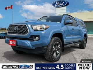 Cavalry Blue 2019 Toyota Tacoma SR5 V6 V6 4D Double Cab 3.5L V6 DOHC 24V LEV3-ULEV70 278hp 6-Speed Automatic 4WD 4WD, 6 Speakers, ABS brakes, Air Conditioning, Alloy wheels, AM/FM radio: SiriusXM, Anti-whiplash front head restraints, Auto High-beam Headlights, Auto-dimming Rear-View mirror, Brake assist, CD player, Driver door bin, Dual front impact airbags, Dual front side impact airbags, Electronic Stability Control, Exterior Parking Camera Rear, Front anti-roll bar, Front Bucket Seats, Front fog lights, Front reading lights, Front wheel independent suspension, Illuminated entry, Knee airbag, Occupant sensing airbag, Outside temperature display, Overhead airbag, Overhead console, Panic alarm, Passenger door bin, Power door mirrors, Power steering, Power windows, Rear step bumper, Remote keyless entry, Speed control, Speed-sensing steering, Split folding rear seat, Steering wheel mounted audio controls, Tachometer, Telescoping steering wheel, Tilt steering wheel, Traction control, Trip computer, Variably intermittent wipers.

Awards:
  * ALG Canada Residual Value Awards, Residual Value Awards