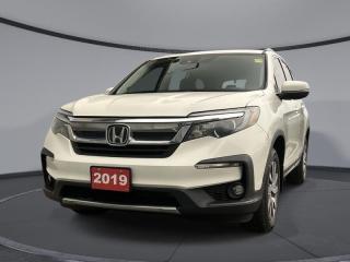 <b>Leather Seats,  Navigation,  Sunroof,  Heated Steering Wheel,  Memory Seats!</b><br> <br>    Big on cargo space as it is on style, this 2019 Honda Pilot is more than an SUV, its how your family achieves their goals. This  2019 Honda Pilot is for sale today in Sudbury. <br> <br>With a highly flexible interior, an excellent extremely comfortable ride quality and loads of active safety gear, the 2019 Honda Pilot should be at the top of your list when looking for a new family SUV. It offers an exceptional blend of utility, comfort, and safety making it an essential vehicle for a busy family life. If your family needs a new partner in their antics, look no further than this 2019 Honda Pilot.This  SUV has 116,764 kms. Its  black in colour  . It has an automatic transmission and is powered by a  3.5L V6 24V GDI SOHC engine.  <br> <br> Our Pilots trim level is EX-L Navi AWD. This EX-L Navi Pilot adds navigation, leather seats, a one touch power moonroof, blind spot display, heated steering wheel, memory driver seat and side mirrors, power liftgate, parking sensors, SiriusXM, HD Radio, fog lights, side mirror turn signals, auto-dimming rearview mirror, and HomeLink remote system. The interior is also loaded with heated seats, proximity keyless entry, remote start, Apple CarPlay, Android Auto, Bluetooth, audio display, Siri EyesFree, and Wi-Fi tethering. Driver assistance technology is here in truckloads with collision mitigation, lane keep assist, adaptive cruise, a 7 inch driver information interface, and automatic highbeams. Other great features include aluminum wheels, LED lighting, active noise cancellation, multi-angle rearview mirror, and tri-zone automatic climate control with rear seat controls. This vehicle has been upgraded with the following features: Leather Seats,  Navigation,  Sunroof,  Heated Steering Wheel,  Memory Seats,  Power Liftgate,  Heated Seats. <br> <br>To apply right now for financing use this link : <a href=https://www.palladinohonda.com/finance/finance-application target=_blank>https://www.palladinohonda.com/finance/finance-application</a><br><br> <br/><br>Palladino Honda is your ultimate resource for all things Honda, especially for drivers in and around Sturgeon Falls, Elliot Lake, Espanola, Alban, and Little Current. Our dealership boasts a vast selection of high-class, top-quality Honda models, as well as expert financing advice and impeccable automotive service. These factors arent what set us apart from other dealerships, though. Rather, our uncompromising customer service and professionalism make every experience unforgettable, and keeps drivers coming back. The advertised price is for financing purchases only. All cash purchases will be subject to an additional surcharge of $2,501.00. This advertised price also does not include taxes and licensing fees.<br> Come by and check out our fleet of 110+ used cars and trucks and 60+ new cars and trucks for sale in Sudbury.  o~o