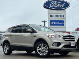 <b>Low Mileage, Bluetooth,  Heated Seats,  Rear View Camera,  SiriusXM,  Aluminum Wheels!</b><br> <br> Gear up for winter with Bourgeois Motors Ford! Throughout November, when you purchase, lease, or finance any in-stock new or pre-owned vehicle you can take advantage of our volume discount pricing on winter wheel and tire packages! Speak with your sales consultant to find out how you can get a grip on winter driving while keeping your cash in your pockets. Stay ahead of winter and your budget at Bourgeois Motors Ford! <br> <br> Compare at $20595 - Our Price is just $19995! <br> <br>   Canadians love small crossovers.  With over 48,000 Ford Escapes sold last year in Canada, you have to have a closer look at this leader in this segment. This  2017 Ford Escape is fresh on our lot in Midland. <br> <br>For 2017, the Escape has under gone a small refresh, updating the exterior with a more angular tailgate, LED tail lights, an aluminum hood and a new fascia that makes it look similar to the other Ford crossovers.  Inside, the Escape now comes with an electric E brake, which frees up the centre console for more cargo and arm space.This low mileage  SUV has just 40,362 kms. Its  white gold metallic in colour  . It has a 6 speed automatic transmission and is powered by a  179HP 1.5L 4 Cylinder Engine.  It may have some remaining factory warranty, please check with dealer for details. <br> <br> Our Escapes trim level is SE. This Escape SE offers a satisfying blend of features and value. It comes with a SYNC infotainment system with Bluetooth connectivity, SiriusXM, a USB port, a rearview camera, heated front seats, steering wheel-mounted audio and cruise control, dual-zone automatic climate control, power windows, power doors, aluminum wheels, fog lamps, and more. This vehicle has been upgraded with the following features: Bluetooth,  Heated Seats,  Rear View Camera,  Siriusxm,  Aluminum Wheels,  Steering Wheel Audio Control. <br> To view the original window sticker for this vehicle view this <a href=http://www.windowsticker.forddirect.com/windowsticker.pdf?vin=1FMCU9GDXHUD80186 target=_blank>http://www.windowsticker.forddirect.com/windowsticker.pdf?vin=1FMCU9GDXHUD80186</a>. <br/><br> <br>To apply right now for financing use this link : <a href=https://www.bourgeoismotors.com/credit-application/ target=_blank>https://www.bourgeoismotors.com/credit-application/</a><br><br> <br/><br>At Bourgeois Motors Ford in Midland, Ontario, we proudly present the regions most expansive selection of used vehicles, ensuring youll find the perfect ride in our shared inventory. With a network of dealers serving Midland and Parry Sound, your ideal vehicle is within reach. Experience a stress-free shopping journey with our family-owned and operated dealership, where your needs come first. For over 78 years, weve been committed to serving Midland, Parry Sound, and nearby communities, building trust and providing reliable, quality vehicles. Discover unmatched value, exceptional service, and a legacy of excellence at Bourgeois Motors Fordwhere your satisfaction is our priority.Please note that our inventory is shared between our locations. To avoid disappointment and to ensure that were ready for your arrival, please contact us to ensure your vehicle of interest is waiting for you at your preferred location. <br> Come by and check out our fleet of 80+ used cars and trucks and 200+ new cars and trucks for sale in Midland.  o~o