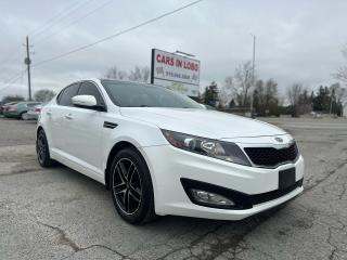 <p><span style=font-size: 14pt;><strong>2013 Kia Optima EX - 118xxxKM - Certified - Leather loaded </strong></span></p><p><span style=font-size: 14pt;>Introducing the 2013 Kia Optima EX with 118,000 kilometers – where style meets reliability. This sedan stands out with its sleek design and impressive features. With a proven track record of performance and efficiency, the Optima EX delivers a smooth and enjoyable ride. Its spacious and well-appointed interior provides comfort and convenience for both driver and passengers. Dont miss out on the opportunity to elevate your driving experience. Schedule your test drive today and discover the excellence of the 2013 Kia Optima EX!</span></p><p><span style=font-size: 14pt;><strong>CARS IN LOBO LTD. (Buy - Sell - Trade - Finance) <br /></strong></span><span style=font-size: 14pt;><strong style=font-size: 18.6667px;>Office# - 519-666-2800<br /></strong></span><span style=font-size: 14pt;><strong>TEXT 24/7 - 226-289-5416</strong></span></p><p><span style=font-size: 12pt;>-> LOCATION <a title=Location  href=https://www.google.com/maps/place/Cars+In+Lobo+LTD/@42.9998602,-81.4226374,15z/data=!4m5!3m4!1s0x0:0xcf83df3ed2d67a4a!8m2!3d42.9998602!4d-81.4226374 target=_blank rel=noopener>6355 Egremont Dr N0L 1R0 - 6 KM from fanshawe park rd and hyde park rd in London ON</a><br />-> Quality pre owned local vehicles. CARFAX available for all vehicles <br />-> Certification is included in price unless stated AS IS or ask about our AS IS pricing<br />-> We offer Extended Warranty on our vehicles inquire for more Info<br /></span><span style=font-size: small;><span style=font-size: 12pt;>-> All Trade ins welcome (Vehicles,Watercraft, Motorcycles etc.)</span><br /><span style=font-size: 12pt;>-> Financing Available on qualifying vehicles <a title=FINANCING APP href=https://carsinlobo.ca/fast-loan-approvals/ target=_blank rel=noopener>APPLY NOW -> FINANCING APP</a></span><br /><span style=font-size: 12pt;>-> Register & license vehicle for you (Licensing Extra)</span><br /><span style=font-size: 12pt;>-> No hidden fees, Pressure free shopping & most competitive pricing</span></span></p><p><span style=font-size: small;><span style=font-size: 12pt;>MORE QUESTIONS? FEEL FREE TO CALL (519 666 2800)/TEXT </span></span><span style=font-size: 18.6667px;>226-289-5416</span><span style=font-size: small;><span style=font-size: 12pt;> </span></span><span style=font-size: 12pt;>/EMAIL (Sales@carsinlobo.ca)</span></p>