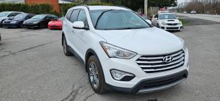 <p class=MsoNormal>2016 Hyundai Santa Fe XL 6 cylinder 3.3L engine with a 6 speed automatic transmission all wheel drive. 7 Passengers with bench seats second row, Cloth seats, Heated Front & Rear Seats, Bluetooth Connectivity - Back-Up Camera - Rear Parking Aid - Cruise Control - Climate Control - Multi-Zone Air Conditioning - Heated Steering Wheel - Alloy Wheels, Remote Start & Mounted Hitch. 163,331K KM. Asking price $15,995. </p>