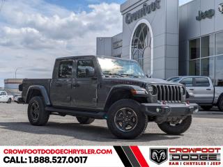 <b>Low Mileage, Heavy Duty Suspension,  Sunroof,  Premium Audio,  Navigation,  Climate Control!</b><br> <br> Welcome to Crowfoot Dodge, Calgarys New and Pre-owned Superstore proudly serving Albertans for 44 years!<br> <br> Compare at $63995 - Our Price is just $60995! <br> <br>   Complete with a cargo bed and removable panels for an open air experience, you can have your Jeep and haul with it too. This  2023 Jeep Gladiator is fresh on our lot in Calgary. <br> <br>Built with unmistakable Jeep styling and off-road capability and the capability and hauling power of a pickup truck, you get the best of both worlds with this incredible machine. Thanks to its unmistakable style, rugged off-road technology, and an exhilarating open air truck experience, this unique Jeep Gladiator is ready to change the 4X4 game.This low mileage  Regular Cab 4X4 pickup  has just 16,822 kms. Stock number 10677 is white in colour  . It has a 6 speed manual transmission and is powered by a  smooth engine. <br> <br> Our Gladiators trim level is Rubicon. Sitting at the top of the Gladiator range, this Rubicon trim is fully loaded with FOX premium dampers, 7 skid plates, heavy-duty suspension, a manual Targa composite first-row sunroof, a 9-speaker Alpine premium audio setup, voice-activated navigation, dual-zone climate control, class III towing equipment with a trailer wiring harness and trailer sway control, a full-size spare with underbody storage, removable doors and windows, and a manual convertible top with fixed roll-over protection. This rugged truck also features great convenience features like proximity keyless entry with push button start, illuminated front and rear cupholders, two 12-volt DC and a 120-volt AC power outlets, and tons of storage space. Handling infotainment and connectivity duties is an 8.4-inch screen powered by Uconnect 4, and features Apple CarPlay, Android Auto, 4G LTE WiFi hotspot internet access, and streaming audio. This vehicle has been upgraded with the following features: Heavy Duty Suspension,  Sunroof,  Premium Audio,  Navigation,  Climate Control,  Apple Carplay,  Android Auto. <br> <br/><br> Buy this vehicle now for the lowest bi-weekly payment of <b>$397.32</b> with $0 down for 96 months @ 7.99% APR O.A.C. ( Plus GST      / Total Obligation of $82642  ).  See dealer for details. <br> <br>At Crowfoot Dodge, we offer:<br>
<ul>
<li>Over 500 New vehicles available and 100 Pre-Owned vehicles in stock...PLUS fresh trades arriving daily!</li>
<li>Financing and leasing arrangements with rates from prime +0%</li>
<li>Same day delivery.</li>
<li>Experienced sales staff with great customer service.</li>
</ul><br><br>
Come VISIT us today!<br><br> Come by and check out our fleet of 80+ used cars and trucks and 130+ new cars and trucks for sale in Calgary.  o~o