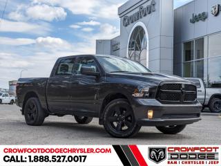 <b>Low Mileage, Rear Camera,  Cruise Control,  Tow Hitch,  Air Conditioning,  Power Windows!</b><br> <br> Welcome to Crowfoot Dodge, Calgarys New and Pre-owned Superstore proudly serving Albertans for 44 years!<br> <br> Compare at $45995 - Our Price is just $43995! <br> <br>   This 2022 Ram 1500 Classic is the truck to have, thanks to its incredible powertrain and a well-appointed interior. This  2022 Ram 1500 Classic is fresh on our lot in Calgary. <br> <br>The reasons why this Ram 1500 Classic stands above its well-respected competition are evident: uncompromising capability, proven commitment to safety and security, and state-of-the-art technology. From its muscular exterior to the well-trimmed interior, this 2022 Ram 1500 Classic is more than just a workhorse. Get the job done in comfort and style while getting a great value with this amazing full size truck. This low mileage  Regular Cab 4X4 pickup  has just 23,767 kms. Stock number 10679 is grey in colour  . It has a 8 speed automatic transmission and is powered by a  smooth engine. <br> <br> Our 1500 Classics trim level is Tradesman. This highly capable Ram 1500 Classic Tradesman is a serious work truck that comes well equipped with an easy to clean rugged vinyl floor, heavy-duty shock absorbers, class III towing equipment, electronic stability control and trailer sway control. This Ram 1500 stands ready to serve with power heated mirrors, a ParkView rear back-up camera, cruise control, hill start assist, an infotainment hub with radio 3.0 and a USB port, automatic headlights, power windows, power doors, and more. This vehicle has been upgraded with the following features: Rear Camera,  Cruise Control,  Tow Hitch,  Air Conditioning,  Power Windows,  Power Doors. <br> <br/><br> Buy this vehicle now for the lowest bi-weekly payment of <b>$286.58</b> with $0 down for 96 months @ 7.99% APR O.A.C. ( Plus GST      / Total Obligation of $59609  ).  See dealer for details. <br> <br>At Crowfoot Dodge, we offer:<br>
<ul>
<li>Over 500 New vehicles available and 100 Pre-Owned vehicles in stock...PLUS fresh trades arriving daily!</li>
<li>Financing and leasing arrangements with rates from prime +0%</li>
<li>Same day delivery.</li>
<li>Experienced sales staff with great customer service.</li>
</ul><br><br>
Come VISIT us today!<br><br> Come by and check out our fleet of 80+ used cars and trucks and 130+ new cars and trucks for sale in Calgary.  o~o