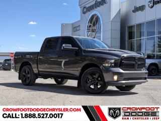 <b>Rear Camera,  Cruise Control,  Tow Hitch,  Air Conditioning,  Power Windows!</b><br> <br> Welcome to Crowfoot Dodge, Calgarys New and Pre-owned Superstore proudly serving Albertans for 44 years!<br> <br> Compare at $49995 - Our Price is just $45995! <br> <br>   This 2022 Ram 1500 Classic is the truck to have, thanks to its incredible powertrain and a well-appointed interior. This  2022 Ram 1500 Classic is fresh on our lot in Calgary. <br> <br>The reasons why this Ram 1500 Classic stands above its well-respected competition are evident: uncompromising capability, proven commitment to safety and security, and state-of-the-art technology. From its muscular exterior to the well-trimmed interior, this 2022 Ram 1500 Classic is more than just a workhorse. Get the job done in comfort and style while getting a great value with this amazing full size truck. This  Regular Cab 4X4 pickup  has 35,965 kms. Stock number 10681 is grey in colour  . It has a 8 speed automatic transmission and is powered by a  smooth engine. <br> <br> Our 1500 Classics trim level is Tradesman. This highly capable Ram 1500 Classic Tradesman is a serious work truck that comes well equipped with an easy to clean rugged vinyl floor, heavy-duty shock absorbers, class III towing equipment, electronic stability control and trailer sway control. This Ram 1500 stands ready to serve with power heated mirrors, a ParkView rear back-up camera, cruise control, hill start assist, an infotainment hub with radio 3.0 and a USB port, automatic headlights, power windows, power doors, and more. This vehicle has been upgraded with the following features: Rear Camera,  Cruise Control,  Tow Hitch,  Air Conditioning,  Power Windows,  Power Doors. <br> <br/><br> Buy this vehicle now for the lowest bi-weekly payment of <b>$299.61</b> with $0 down for 96 months @ 7.99% APR O.A.C. ( Plus GST      / Total Obligation of $62319  ).  See dealer for details. <br> <br>At Crowfoot Dodge, we offer:<br>
<ul>
<li>Over 500 New vehicles available and 100 Pre-Owned vehicles in stock...PLUS fresh trades arriving daily!</li>
<li>Financing and leasing arrangements with rates from prime +0%</li>
<li>Same day delivery.</li>
<li>Experienced sales staff with great customer service.</li>
</ul><br><br>
Come VISIT us today!<br><br> Come by and check out our fleet of 80+ used cars and trucks and 130+ new cars and trucks for sale in Calgary.  o~o