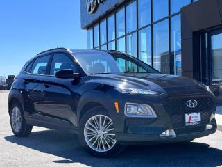 <b>Blind Spot Detection,  Heated Steering Wheel,  Heated Seats,  Aluminum Wheels,  Remote Keyless Entry!</b><br> <br>  Compare at $20509 - Our Price is just $19912! <br> <br>   The KONA is a recent addition to the SUV family made by Hyundai  a new breed of SUV has been born to take on your city street. This  2021 Hyundai Kona is for sale today in Midland. <br> <br>The KONA has been designed to turn heads - and to raise pulses. The dynamic design catches your eye with unique details that highlight the strong Hyundai SUV DNA at its core, starting with our signature cascading front grille design, muscular wheel arches and advanced lighting. Bold accent body panels run along the side and rear bumper for a sporty look. Step inside and instantly experience an exceptional level of comfort thanks to its wealth of features. This Kona is more than just its trendy appearance, its a real urban warrior.This  SUV has 89,969 kms. Its  ultra black pearl in colour  . It has a 6 speed automatic transmission and is powered by a  147HP 2.0L 4 Cylinder Engine.  This unit has some remaining factory warranty for added peace of mind. <br> <br> Our Konas trim level is 2.0L Preferred AWD. This all wheel drive Kona Preferred adds a leather heated steering wheel, blind spot detection with rear cross traffic collision warning, larger aluminum wheels and a proximity key for easy push button starts. You will also get heated front seats, Apple CarPlay, Android Auto, a rear view camera, bluetooth streaming audio, a 60/40 split rear seat, cruise control and much more. This vehicle has been upgraded with the following features: Blind Spot Detection,  Heated Steering Wheel,  Heated Seats,  Aluminum Wheels,  Remote Keyless Entry,  Apple Carplay,  Android Auto. <br> <br>To apply right now for financing use this link : <a href=https://www.bourgeoishyundai.com/finance/ target=_blank>https://www.bourgeoishyundai.com/finance/</a><br><br> <br/><br>BUY WITH CONFIDENCE. Bourgeois Auto Group, we dont just sell cars; for over 75 years, we have delivered extraordinary automotive experiences in every showroom, on the road, and at your home. Offering complimentary delivery in an enclosed trailer. <br><br>Why buy from the Bourgeois Auto Group? Whether you are looking for a great place to buy your next new or used vehicle find a qualified repair center or looking for parts for your vehicle the Bourgeois Auto Group has the answer. We offer both new vehicles and pre-owned vehicles with over 25 brand manufacturers and over 200 Pre-owned Vehicles to choose from. Were constantly changing to meet the needs of our customers and stay ahead of the competition, and we are committed to investing in modern technology to ensure that we are always on the cutting edge. We use very strategic programs and tools that give us current market data to price our vehicles to the market to make sure that our customers are getting the best deal not only on the new car but on your trade-in as well. Ask for your free Live Market analysis report and save time and money. <br><br>WE BUY CARS  Any make model or condition, No purchase necessary. We are OPEN 24 hours a Day/7 Days a week with our online showroom and chat service. Our market value pricing provides the most competitive prices on all our pre-owned vehicles all the time. Market Value Pricing is achieved by polling over 20000 pre-owned websites every day to ensure that every single customer receives real-time Market Value Pricing on every pre-owned vehicle we sell. Customer service is our top priority. No hidden costs or fees, and full disclosure on all services and Carfax®. <br><br>With over 23 brands and over 400 full- and part-time employees, we look forward to serving all your automotive needs! <br> Come by and check out our fleet of 40+ used cars and trucks and 40+ new cars and trucks for sale in Midland.  o~o