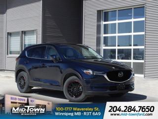Recent Arrival!<BR><BR>One Owner |, Local Trade |, Clean Carfax |, Non Smoker |, Apple Carplay |, Android Auto |, Package AA50.<BR><BR>Odometer is 32622 kilometers below market average! Blue 2021 Mazda CX-5 Grand Touring AWD I4 Turbo 6-Speed Automatic<BR><BR><BR>For further information please contact MidTown Ford sales department directly at 204-284-7650. Dealer #9695.<BR><BR><BR>Reviews:<BR> * The Mazda CX-5 is highly rated for looking and feeling more expensive than it is. Since its introduction, this model has been sought-after by shoppers looking for an up-level crossover driving experience without the up-level price tag. On all elements of styling, handling, and dynamics, owners seem to be impressed. Source: autoTRADER.ca