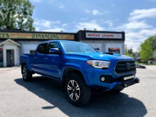 <p>Looking for adventure-ready reliability? Look no further than our 2017 Toyota Tacoma TDR! With its rugged yet refined design, this truck is built to conquer both city streets and off-road trails with ease. Equipped with a powerful engine and advanced off-road capabilities, the Tacoma TDR ensures a smooth ride and exceptional performance in any terrain. Featuring a spacious and comfortable interior loaded with modern amenities, including touchscreen infotainment, Bluetooth connectivity, and safety features like adaptive cruise control and lane departure warning, the Tacoma TDR offers both comfort and peace of mind on every journey. Dont miss out on the opportunity to own this versatile and dependable truck. Visit us today to test drive the 2017 Toyota Tacoma TDR and experience its unmatched quality firsthand!</p><p>Finance Disclaimer: Finance pricing on this website is for website display purpose only. Please contact our office to confirm final pricing. Although the intention is to capture current prices as of the date of publication, pricing is subject to change without notice, and may not be accurate or completely current. While every reasonable effort is made to ensure the accuracy of this data, we are not responsible for any errors or omissions contained on these pages. Please verify any information in question with a dealership sales representative. Information provided at this site does not constitute a guarantee of available prices or financing rate. See dealer for actual prices, payment, and complete details. <br /><br />We invite you to see this vehicle at Presleys Auto Showcase on Carling Avenue just west of Island Park Drive. Call us today to book a test drive.TAXES AND LICENSE FEES ARE EXTRA.Ask us about our NO CHARGE limited Powertrain Warranty. This is for a limited time only. **Some conditions do apply.This vehicle will come with an Ontario Safety or Quebec Inspection.If you are looking to finance a car, Presleys Auto Showcase is your Ottawa, Ontario source for speedy online credit approval at the best car financing rates possible. Presleys Auto Showcase can pre-approve your car loan, even if your good credit rating has been compromised because of bad credit, low credit score, bankruptcy, repossession, collections or late payments. We also specialize in fast car loans for those who are retired, self employed, divorced, new immigrants or students. Let the knowledgeable and helpful auto loan specialists at Presleys Auto Showcase give you the personal touch.</p>