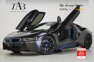 This Beautiful 2019 BMW i8 is a local Ontario vehicle with a clean Carfax report and a remaining manufacture warranty until July 6, 2024 or 80,000kms. It  is a futuristic and innovative plug-in hybrid sports car that combines cutting-edge technology with striking design and performance.

Key Features Includes:

- Coupe
- Navigation
- Bluetooth
- Heads up Display
- Carbon Fiber Interior
- Backup Camera
- Parking Sensors
- Harman Kardon Sound System
- Sirius XM Radio
- Front Heated Seats
- Cruise Control
- Front Collision Warning
- 20" Alloy Wheels


NOW OFFERING 3 MONTH DEFERRED FINANCING PAYMENTS ON APPROVED CREDIT. 

Looking for a top-rated pre-owned luxury car dealership in the GTA? Look no further than Toronto Auto Brokers (TAB)! Were proud to have won multiple awards, including the 2023 GTA Top Choice Luxury Pre Owned Dealership Award, 2023 CarGurus Top Rated Dealer, 2024 CBRB Dealer Award, the Canadian Choice Award 2024,the 2024 BNS Award, the 2023 Three Best Rated Dealer Award, and many more!

With 30 years of experience serving the Greater Toronto Area, TAB is a respected and trusted name in the pre-owned luxury car industry. Our 30,000 sq.Ft indoor showroom is home to a wide range of luxury vehicles from top brands like BMW, Mercedes-Benz, Audi, Porsche, Land Rover, Jaguar, Aston Martin, Bentley, Maserati, and more. And we dont just serve the GTA, were proud to offer our services to all cities in Canada, including Vancouver, Montreal, Calgary, Edmonton, Winnipeg, Saskatchewan, Halifax, and more.

At TAB, were committed to providing a no-pressure environment and honest work ethics. As a family-owned and operated business, we treat every customer like family and ensure that every interaction is a positive one. Come experience the TAB Lifestyle at its truest form, luxury car buying has never been more enjoyable and exciting!

We offer a variety of services to make your purchase experience as easy and stress-free as possible. From competitive and simple financing and leasing options to extended warranties, aftermarket services, and full history reports on every vehicle, we have everything you need to make an informed decision. We welcome every trade, even if youre just looking to sell your car without buying, and when it comes to financing or leasing, we offer same day approvals, with access to over 50 lenders, including all of the banks in Canada. Feel free to check out your own Equifax credit score without affecting your credit score, simply click on the Equifax tab above and see if you qualify.

So if youre looking for a luxury pre-owned car dealership in Toronto, look no further than TAB! We proudly serve the GTA, including Toronto, Etobicoke, Woodbridge, North York, York Region, Vaughan, Thornhill, Richmond Hill, Mississauga, Scarborough, Markham, Oshawa, Peteborough, Hamilton, Newmarket, Orangeville, Aurora, Brantford, Barrie, Kitchener, Niagara Falls, Oakville, Cambridge, Kitchener, Waterloo, Guelph, London, Windsor, Orillia, Pickering, Ajax, Whitby, Durham, Cobourg, Belleville, Kingston, Ottawa, Montreal, Vancouver, Winnipeg, Calgary, Edmonton, Regina, Halifax, and more.

Call us today or visit our website to learn more about our inventory and services. And remember, all prices exclude applicable taxes and licensing, and vehicles can be certified at an additional cost of $799.