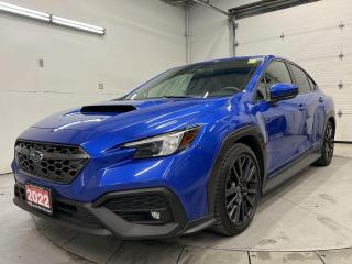 STUNNING WORLD RALLY BLUE PEARL ALL-WHEEL DRIVE 6-SPEED MANUAL SPORT!! Sunroof, heated seats, premium Harman/Kardon audio system, blind spot monitor, rear cross-traffic alert, massive 11.6-inch screen w/ Apple CarPlay/Android Auto, backup camera, 18-inch alloys, full power group incl. power seat, dual-zone climate control, automatic headlights w/ auto highbeams, keyless entry w/ push start, auto-dimming rearview mirror, leather-wrapped steering wheel, Bluetooth, fog lights, cruise control and Sirius XM!