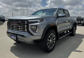 <p style=text-align: center;><span style=font-size: 18pt;><strong>2023 GMC CANYON 4WD CREW CAB DENALI</strong></span></p><p style=text-align: center;><span style=font-size: 18pt;><strong>2.7L TURBO HIGH OUTPUT GASOLINE ENGINE</strong></span></p><p style=text-align: center;><span style=font-size: 14pt;>310 HORSEPOWER | 430 LB-FT OF TORQUE</span></p><p style=text-align: center;><span style=font-size: 14pt;>TOWING CAPACITY: 7,700 LBS | PAYLOAD CAPACITY: 1,580 LBS | REAR AXLE RATIO: 3.42</span></p><p style=text-align: center;><span style=font-size: 14pt;>11L/100KM HIGHWAY | 13.5L/100KM CITY | 12.4L/100KM COMBINED</span></p><p style=text-align: center;><span style=font-size: 18pt;><strong>8-SPEED AUTOMATIC TRANSMISSION</strong></span></p><p style=text-align: center;><span style=font-size: 18pt;><strong>20 DIAMOND CUT DARK GREY ALUMINUM WHEELS</strong></span></p><p style=text-align: center;> </p><p style=text-align: center;> </p><p style=text-align: center;><strong><span style=font-size: 14pt;>PERFORMANCE & MECHANICAL</span></strong></p><p style=text-align: center;><span style=font-size: 14pt;>Off-road Suspension with 2 Factory-Installed Lift and Wider Chassis, Auto Locking Rear Differential, Autotrac Electronic </span><span style=font-size: 18.6667px;>2-Speed </span><span style=font-size: 14pt;>Transfer Case, </span><span style=font-size: 18.6667px;>Driver</span><span style=font-size: 18.6667px;> </span><span style=font-size: 14pt;>Mode Selector: Off Road, Terrain, Tow/Haul and Normal, Stabilitrak w/ Trailer Sway Control & Hill Start Assist</span></p><p style=text-align: center;><strong><span style=font-size: 18.6667px;>CONNECTIVITY & TECHNOLOGY</span></strong></p><p style=text-align: center;><span style=font-size: 14pt;>11.3 Diagonal Colour Touchscreen, GMC Premium Infotainment System w/ Google Built-in Compatibility, Wireless Apple Carplay and Wireless Android Auto for Compatible Phones, </span><span style=font-size: 14pt;>SiriusXM Radio Capable, HD Surround Vision, Multicolour 6.3 Diagonal Head-Up Display, Adaptive Cruise Control, Remote Vehicle Start</span></p><p style=text-align: center;><strong><span style=font-size: 14pt;>INTERIOR</span></strong></p><p style=text-align: center;><span style=font-size: 14pt;> 11 Diagonal Driver Information Centre, Ventilated Front Seats, 6-Way Power Passenger Seat & Power Passenger Lumbar Control, Driver Memory, Recalls Driver Presets for Seat, Heated Steering Wheel, Wireless Charging, Automatic </span><span style=font-size: 18.6667px;>Dual Zone</span><span style=font-size: 18.6667px;> </span><span style=font-size: 14pt;>Climate Control, 8-way Power Driver Seat, Power Driver Lumbar Control, Heated Front Seats, Tilt and Telescoping Steering Column, Auto-dimming Inside Rearview Mirror, 120V Power Outlet at Rear of Centre Console, Lighted Visor Mirrors, Rear Charge-only USB Ports, Tire Pressure Monitoring</span></p><p style=text-align: center;><strong><span style=font-size: 14pt;>EXTERIOR</span></strong></p><p style=text-align: center;><span style=font-size: 14pt;>Chrome Assist Steps, Spray-on Bedliner, 20 Diamond Cut Dark Grey Aluminum Wheels, 275/60R-20 All Terrain Tires, Multi-stow Tailgate EZ-Lift & Lower Tailgate, LED Headlamps, LED Signature Daytime Running Lamps, Rear LED Combination Taillamps, 120V Bed-Mounted Power  Outlet, Remote Locking Tailgate</span></p><p style=text-align: center;><strong><span style=font-size: 18.6667px;>SAFETY & SECURITY</span></strong></p><p style=text-align: center;><span style=font-size: 14pt;>GMC Pro Safety: Automatic Emergency Braking, Forward Collision Alert, Front Pedestrian Braking with Bicyclist Detection, Lane Keep Assist w/ Lane Departure Warning, Following Distance Indicator (Requires a Future Software Update), Intellibeam-Auto High Beam, Rear Park Assist</span></p><p style=text-align: center;><strong><span style=font-size: 14pt;>OPTIONAL EQUIPMENT</span></strong></p><p style=text-align: center;><span style=font-size: 14pt;><span style=font-size: 18.6667px;><em><span style=text-decoration: underline;>Prograde Trailering System:</span></em><br />Trailer Hitch and 7-pin Connector, Trailer Brake Controller, Trailering App, </span></span></p><p style=text-align: center;><em><span style=text-decoration: underline;><span style=font-size: 14pt;><span style=font-size: 18.6667px;>All-weather Floor Liners</span></span></span></em></p><p style=text-align: center;><em><span style=text-decoration: underline;><span style=font-size: 14pt;><span style=font-size: 18.6667px;>220 Amp Alternator</span></span></span></em></p><p style=text-align: center;> </p><p style=text-align: center;> </p><p style=box-sizing: border-box; margin-bottom: 1rem; margin-top: 0px; color: #212529; font-family: -apple-system, BlinkMacSystemFont, Segoe UI, Roboto, Helvetica Neue, Arial, Noto Sans, Liberation Sans, sans-serif, Apple Color Emoji, Segoe UI Emoji, Segoe UI Symbol, Noto Color Emoji; font-size: 16px; background-color: #ffffff; text-align: center; line-height: 1;><span style=box-sizing: border-box; font-family: arial, helvetica, sans-serif;><span style=box-sizing: border-box; font-weight: bolder;><span style=box-sizing: border-box; font-size: 14pt;>Here at Lanoue/Amfar Sales, Service & Leasing in Tilbury, we take pride in providing the public with a wide variety of High-Quality Pre-owned Vehicles. We recondition and certify our vehicles to a level of excellence that exceeds the Status Quo. We treat our Customers like family and provide the highest level of service from Start to Finish. If you’d like a smooth & stress-free car shopping experience, give one of our Sales Associates a call at 1-844-682-3325 to help you find your next NEW-TO-YOU vehicle!</span></span></span></p><p style=box-sizing: border-box; margin-bottom: 1rem; margin-top: 0px; color: #212529; font-family: -apple-system, BlinkMacSystemFont, Segoe UI, Roboto, Helvetica Neue, Arial, Noto Sans, Liberation Sans, sans-serif, Apple Color Emoji, Segoe UI Emoji, Segoe UI Symbol, Noto Color Emoji; font-size: 16px; background-color: #ffffff; text-align: center; line-height: 1;><span style=box-sizing: border-box; font-family: arial, helvetica, sans-serif;><span style=box-sizing: border-box; font-weight: bolder;><span style=box-sizing: border-box; font-size: 14pt;>Although we try to take great care in being accurate with the information in this listing, from time to time, errors occur. The vehicle is priced as it is physically equipped. Minor variances will not effect pricing. Please verify the vehicle is As Expected when you visit. Thank You!</span></span></span></p>