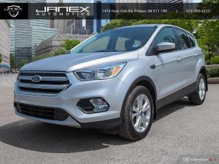 Our great looking, Accident Free 2019 Ford Escape SE in Ingot Silver was born to inject more fun into each day! Powered by a TurboCharged 1.5 Litre EcoBoost 4 Cylinder offers 179hp paired to a paddle-shifted 6 Speed Automatic transmission for easy passing. Our Front Wheel Drive SUV handles beautifully with precise steering, impressive response, agility, and offers approximately 7.8L/100km on the highway. This Escape SE turns heads, check out the prominent hexagonal upper grille, sparkle-silver wheels, dual chrome exhaust tips, fog lamps, sculpted hood, and an athletic stance.    The SE interior greets you with plenty of cargo-carrying capacity to accommodate your next adventure, as well as amenities such as 60/40 split-fold-flat rear seatbacks, a 10-way power driver seat, a rearview camera, AM/FM/CD/MP3, available satellite radio, and SYNC Enhanced Voice Recognition Communication and Entertainment System.    Carefully constructed, Ford Escape offers peace of mind with advanced airbags, stability control, available SOS post-crash alert, tire pressure monitoring, ABS, and traction control. MyKey even lets you customize features such as speed and volume controls for the young drivers of the family. Delivering versatility, utility, efficiency, and style, our Escape SE is a terrific choice! Save this Page and Call for Availability. We Know You Will Enjoy Your Test Drive Towards Ownership!