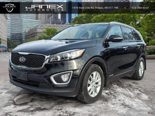 Find yourself drawn in by the allure of our Accident Free 2018 Kia Sorento LX V6 AWD offered in Ebony Black as it boasts a dynamic blend of performance and refinement! Powered by a 3.3 Litre V6 offering 290hp while matched with 6 Speed Sportmatic Automatic transmission for easy passing. With our All Wheel Drive SUV, find the ride impressively quiet and comfortable so you can set off for those family adventures in comfort while scoring approximately 9.4L/100km on the highway. Sleek and sophisticated, our Sorento LX V6 turns heads with amazing 17-inch alloy wheels, privacy glass, silver finish low profile roof rails, rear spoiler, and long swept-back projector beam headlights.     Our LX V6 will pamper you with comfortable cloth seats with Yes Essentials fabric treatment, keyless entry, and steering wheel-mounted controls. The 50/50 split folding 3rd-row seat accommodates those extra passengers.    Our Kia Sorento comes with stability and traction control, multiple airbags, a rear camera, and a reinforced body of advanced high-strength steel among other advanced safety systems. Make no compromises - reward yourself today! Save this Page and Call for Availability. We Know You Will Enjoy Your Test Drive Towards Ownership!