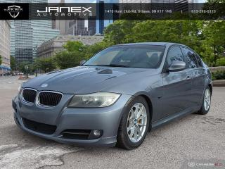 Enjoy the art of driving in our 2011 BMW 323i Sedan presented in Space Grey Metallic. Youll love its dynamic personality, sport-tuned suspension, and sophisticated styling. Powered by a 2.5 Litre 6 Cylinder paired with an authoritative 6 Speed Manual transmission. Youll be looking for reasons to get behind the wheel of our Rear Wheel Drive Coupe, all while attaining outstanding efficiency of approximately 8.4L/100km on the highway. Adaptive xenon headlights and unique 17-inch alloy wheels accentuate the stunning exterior of our 323i Sedan.     Thoughtfully crafted, the 323i interior features rich high-end materials, lots of legroom and adjustable heated front seats. In typical BMW fashion, amenities and options abound to make this your personalized ride.    Safety from BMW surrounds you with ABS, traction and stability control, rollover protection and front-seat side airbags that extend up to head level. Once again, the BMW engineers have crafted a piece of automotive art that youve got to see to believe. Dont deny yourself this 3 Series. Save this Page and Call for Availability. We Know You Will Enjoy Your Test Drive Towards Ownership!