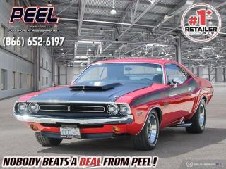 1971 Dodge Challenger US Vehicle - PRICE IS USD $59,999 or CAD $79,999

When Dodge finally got a legitimate pony car to race in the Sports Car Club of Americas Trans American Sedan Championship in 1970, it built a muscle car version for the street that was even wilder than the competition model. Were talking about the 1970 Dodge Challenger T/A. SCCA rules required Dodge to sell production editions of the track car, and Dodge responded with the Challenger T/A. The race cars ran a de-stroked 305-cid version of Mopars fine 340-cid V-8. It had a four-barrel carb and some 440 bhp. Street T/As stayed with the 340, but upped the ante with a trio of two-barrel Holleys atop an Edelbrock aluminum intake manifold making 290hp!

This 1971 Dodge Challenger, fully restored with a 340ci V8, nice interior and bathed in red with satin black accenting. What was a 318ci grocery getter in green with a vinyl top is now turned into a 340 T/A with a six pack to feed it, and great paint with straight steel.

 

Exterior

A fine coat of red bathes the coke bottle side steel panels which are minding their gaps very nicely. The thin nose upfront sports dual headlights in a small grille surrounded by trim and a lower bumper which are near perfect. A satin black hood with a large scoop is hood pinned to the car, and then the excitement begins. Red front quarters have the beginnings of a black racing stripe that gets progressively wider as you move to the rear quarter, past the doors. The correct T/A badging is within this stripe, and just below the chrome trimmed wheel well is another sticker badge denoting a 340 Six Pak. This stripe ends on the mid section of the rear quarter where we see a few vents just above the shiny side exit exhaust pipe, and another trimmed wheel well. On back the shape emulates and compliments the front of the car where a small black satin spoiler is atop the trunk lid, again with more Challenger T/A badging and a nice shiny bumper below. 15 inch rally dish trimmed wheels are on all 4 corners and wrapped in raised white letter BFG T/As. You can look closely at this car as attention to detail has been paid at every turn, and overall, very nicely done. Note: some slight rust bubbling around the wheel wells, and just a slight area of orange peel paint, again around the wheel well areas.

 

Interior

Molded black plastic and vinyl makes up the door panels which have a centrally located wood panel just above the door pull complete with the "fratzog" badge in the center. Shiny cranks and door actuators as well as a mirror toggle can be seen on these doors. Slipping inside to the high back buckets in black tuck and roll inserts with shiny bolsters and nearly showroom condition for all the seats including the rear bench. A nicely styled center console in black with more wood accenting, houses a glovebox, and the pistoling grip wood accented shift lever. Moving up to the dash which has been completely restored we note round gauges, clean levers and shiny knobs in a textured black background. An aftermarket AM/FM/CD player is now installed very neatly where the original radio was. Nice black carpeting is covering the floors, and a rimblow wood rimmed steering wheel is fronting the dash.

 

Drive train

Within the pristine engine bay now sits a 340ci V8 nicely painted orange, and it has a six pack carburetor setup on top. The air cleaner and subsequent rubber surround creates a seal within the scoop valley of the underside of the hood. All hoses are nice and shiny, no corrosion on any bolt ons, and a very nice engine bay presentation. On back is an A727 Torqueflite 3-speed automatic which feeds power to an 8-3/4-inch rear axle. Nice headers have been put on to aid in the breathing and spinning the rear tires.

 

Undercarriage

All very clean structurally sound and nary even a hint of rust. An H pipe exhaust snakes its way rearward taking a detour for the exits on both sides just prior to the rear wheel well. Torsion bar suspension is on front along with power disc brakes, and on back are leaf springs and power drum brakes. Definitely decent quality under here.

 

Drive-Ability 

No test pilots. An absolute pleasure to drive this beauty and will not disappoint. Plenty of power for acceleration on the straight line, good handling, and bias free braking on the panic stop. Interior is comfy, and all functions were working well.

 

An overall great job on the restoration and change to the T/A status, they got it all right. Nice paint, with the satin accenting, correct stripe badging, straight steel, and comfy shiny interior. I feel like Im in the showroom and it is back in 1971.

Odometer in picture is in miles - approximately 39,000 KM

 

Peel Chrysler in Mississauga Ontario serves and delivers to buyers from all corners of Ontario and Canada including Mississauga, Toronto, Oakville, North York, Richmond Hill, Ajax, Hamilton, Niagara Falls, Brampton, Thornhill, Scarborough, Vaughan, London, Windsor, Cambridge, Kitchener, Waterloo, Brantford, Sarnia, Pickering, Huntsville, Milton, Woodbridge, Maple, Aurora, Newmarket, Orangeville, Georgetown, Stouffville, Markham, North Bay, Sudbury, Barrie, Sault Ste. Marie, Parry Sound, Bracebridge, Gravenhurst, Oshawa, Ajax, Kingston, Innisfil and surrounding areas. On our website www.peelchrysler.com you will find a vast selection of new vehicles including the new and used Ram 1500, 2500 and 3500. Chrysler Grand Caravan, Chrysler Pacifica, Jeep Cherokee, Wrangler and more. All vehicles are priced to sell. We deliver throughout Canada. website or call us 1-866-652-6197