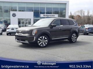 New Price! Recent Arrival! Green 2020 Kia Telluride SX AWD | Sirus XM | Apple Carplay | Android Auto | Mo AWD 8-Speed Automatic 3.8L V6 Bridgewater Volkswagen, Located in Bridgewater Nova Scotia.10 Speakers, 3.648 Final Drive Ratio, 3rd row seats: split-bench, 4-Wheel Disc Brakes, ABS brakes, Air Conditioning, Alloy wheels, AM/FM Radio, AM/FM radio: SiriusXM, Apple CarPlay & Android Auto, Auto High-beam Headlights, Auto-dimming Rear-View mirror, Automatic temperature control, Brake assist, Bumpers: body-colour, Compass, Delay-off headlights, Driver door bin, Driver vanity mirror, Dual front impact airbags, Dual front side impact airbags, Electronic Stability Control, Emergency communication system: 911 Connect, Four wheel independent suspension, Front anti-roll bar, Front Bucket Seats, Front dual zone A/C, Front fog lights, Front reading lights, Fully automatic headlights, Garage door transmitter: HomeLink, Heated door mirrors, Heated front seats, Heated steering wheel, Illuminated entry, Knee airbag, Leather Shift Knob, Leather steering wheel, Low tire pressure warning, Memory seat, Navigation System, Occupant sensing airbag, Outside temperature display, Overhead airbag, Overhead console, Panic alarm, Passenger door bin, Passenger vanity mirror, Power door mirrors, Power driver seat, Power Liftgate, Power moonroof, Power passenger seat, Power steering, Power windows, Radio data system, Rear air conditioning, Rear anti-roll bar, Rear audio controls, Rear reading lights, Rear window defroster, Rear window wiper, Reclining 3rd row seat, Remote keyless entry, Roof rack: rails only, Security system, Speed control, Speed-sensing steering, Split folding rear seat, Spoiler, Steering wheel mounted audio controls, Sun blinds, Tachometer, Telescoping steering wheel, Tilt steering wheel, Traction control, Trip computer, Turn signal indicator mirrors, Variably intermittent wipers, Ventilated front seats.Certification Program Details: 150 Points Inspection Fresh Oil Change Free Carfax Full Detail 2 years MVI Full Tank of Gas The 150+ point inspection includes: Engine Instrumentation Interior components Pre-test drive inspections The test drive Service bay inspection Appearance Final inspection