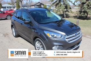 <p><strong>SASKATCHEWAN VEHICLE ACCIDENT FREE</strong></p>

<p>Our 2019 Ford Escape SEL has been through a <strong>presale inspection fresh full synthetic oil service. Carfax reports Saskatchewan Vehicle Accident free. Financing available on site Trades Encouraged Guaranteed approval. Aftermarket warranties avaialable to fit every need and budget. </strong>Sensible turbocharged 1.5-liter four-cylinder with 179 hp engine paired with a six-speed automatic transmission. roof rails, foglights, a keyless entry keypad, rear privacy glass, push-button ignition, dual-zone automatic climate control, rear air vents, an eight-way power-adjustable driver seat (with power lumbar adjustment), heated front seats, a rear center armrest and satellite radio. Sync 3 tech package, which includes an 8-inch touchscreen, enhanced voice controls, Apple CarPlay and Android Auto, Sync Connect (which includes remote app services and onboard Wi-Fi), and a nine-speaker sound system with dual USB ports. SEL bundles all the SE equipment and adds a power liftgate, roof rack rails, a leather-wrapped steering wheel and shift knob, Leather heated seats, power-adjustable side mirrors with heating, and rear parking sensors. A panoramic sunroof and 18-inch wheels. A Safe and Smart package includes adaptive cruise control, forward collision warning with automatic emergency braking, automatic high beams and wipers, blind-spot monitoring and rear cross-traffic alert, and lane departure warning and intervention.</p>

<p><span style=color:#2980b9><strong>Siman Auto Sales is large enough to make a difference but small enough to care. We are family owned and operated, and have been proudly serving Saskatchewan car buyers since 1998. We offer on site financing, consignment, automotive repair and over 90 preowned vehicles to choose from.</strong></span></p>