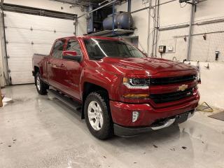 ONLY 34,000 KMS!! STUNNING CAJUN RED TINTCOAT CREW CAB LT Z71 W/ PREMIUM 5.3L V8 AND CONVENIENCE PACKAGE! Heated seats, remote start, tonneau cover, backup camera, Rancho shocks, running boards, 18-inch alloys, tow package, dual-zone climate control, automatic headlights and more!! This vehicle just landed and is awaiting a full detail and photo shoot. Contact us and book your road test today!
