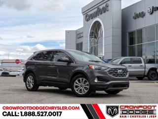 <b>Leather Seats,  Premium Audio,  Heated Seats,  Power Liftgate,  Apple CarPlay!</b><br> <br> Welcome to Crowfoot Dodge, Calgarys New and Pre-owned Superstore proudly serving Albertans for 44 years!<br> <br> Compare at $39995 - Our Price is just $37995! <br> <br>   Change the game with the unique styling of the aggressive Ford Edge. This  2022 Ford Edge is fresh on our lot in Calgary. <br> <br>With meticulous attention to detail and amazing style, the Ford Edge seamlessly integrates power, performance and handling with awesome technology to help you multitask your way through the challenges that life throws your way. Made for an active lifestyle and spontaneous getaways, the Ford Edge is as rough and tumble as you are. Push the boundaries and stay connected to the road with this sweet ride!This  SUV has 92,645 kms. Stock number 10689 is silver in colour  . It has a 8 speed automatic transmission and is powered by a  smooth engine.  This unit has some remaining factory warranty for added peace of mind. <br> <br> Our Edges trim level is Titanium. Upgrading to this Edge Titanium is a great choice as it comes loaded with an impressive list of features including unique aluminum wheels and exterior chrome trim, a premium 12 speaker Bang & Olufsen sound system, a power rear liftgate, power and heated leather seats, FordPass Connect with a 4G LTE hotspot, a 12 inch touchscreen featuring SYNC 4, wireless Apple CarPlay and Android Auto, a leather wrapped steering wheel and dual zone automatic climate control. For added safety and convenience, you will also get Ford Co-Pilot360 with blind spot assist, lane keep assist, automatic emergency braking, lane departure warning, a proximity key for push button start, rear parking sensors, front fog lights, a remote engine start plus so much more.
 This vehicle has been upgraded with the following features: Leather Seats,  Premium Audio,  Heated Seats,  Power Liftgate,  Apple Carplay,  Android Auto,  Remote Start. <br> <br/><br> Buy this vehicle now for the lowest bi-weekly payment of <b>$247.50</b> with $0 down for 96 months @ 7.99% APR O.A.C. ( Plus GST      / Total Obligation of $51480  ).  See dealer for details. <br> <br>At Crowfoot Dodge, we offer:<br>
<ul>
<li>Over 500 New vehicles available and 100 Pre-Owned vehicles in stock...PLUS fresh trades arriving daily!</li>
<li>Financing and leasing arrangements with rates from prime +0%</li>
<li>Same day delivery.</li>
<li>Experienced sales staff with great customer service.</li>
</ul><br><br>
Come VISIT us today!<br><br> Come by and check out our fleet of 90+ used cars and trucks and 130+ new cars and trucks for sale in Calgary.  o~o
