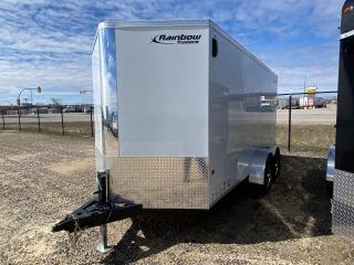 <p>Gently used 2023 7 x 14 Rainbow Cargo trailer with rear ramp door in White.  Cross trak aluminum wheels, mud flaps, translucent roof, v-nose front, 2 5/16 ball coupler, 5200 lb axles rated at 9900 lbs.</p>