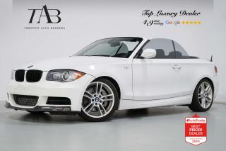 This Beautiful 2011 BMW 1 Series 135i  is a compact luxury sports car that offers a thrilling driving experience, stylish design, and premium features with clean Carfax report. It is powered by a 3.0-liter inline-six twin-turbocharged engine that produces around 300 horsepower and 300 lb-ft of torque.

Key Features Includes:

- 135i
- TwinPower Turbo
- M-Sport
- Cabriolet
- USB
- AUX
- Harman Kardon Sound System
- Front Heated Seats
- Cruise Control
- Carbon Fiber Spoiler
- BMW Dynamic Xenon
- Paddle Shift

NOW OFFERING 3 MONTH DEFERRED FINANCING PAYMENTS ON APPROVED CREDIT. 

Looking for a top-rated pre-owned luxury car dealership in the GTA? Look no further than Toronto Auto Brokers (TAB)! Were proud to have won multiple awards, including the 2023 GTA Top Choice Luxury Pre Owned Dealership Award, 2023 CarGurus Top Rated Dealer, 2024 CBRB Dealer Award, the Canadian Choice Award 2024,the 2024 BNS Award, the 2023 Three Best Rated Dealer Award, and many more!

With 30 years of experience serving the Greater Toronto Area, TAB is a respected and trusted name in the pre-owned luxury car industry. Our 30,000 sq.Ft indoor showroom is home to a wide range of luxury vehicles from top brands like BMW, Mercedes-Benz, Audi, Porsche, Land Rover, Jaguar, Aston Martin, Bentley, Maserati, and more. And we dont just serve the GTA, were proud to offer our services to all cities in Canada, including Vancouver, Montreal, Calgary, Edmonton, Winnipeg, Saskatchewan, Halifax, and more.

At TAB, were committed to providing a no-pressure environment and honest work ethics. As a family-owned and operated business, we treat every customer like family and ensure that every interaction is a positive one. Come experience the TAB Lifestyle at its truest form, luxury car buying has never been more enjoyable and exciting!

We offer a variety of services to make your purchase experience as easy and stress-free as possible. From competitive and simple financing and leasing options to extended warranties, aftermarket services, and full history reports on every vehicle, we have everything you need to make an informed decision. We welcome every trade, even if youre just looking to sell your car without buying, and when it comes to financing or leasing, we offer same day approvals, with access to over 50 lenders, including all of the banks in Canada. Feel free to check out your own Equifax credit score without affecting your credit score, simply click on the Equifax tab above and see if you qualify.

So if youre looking for a luxury pre-owned car dealership in Toronto, look no further than TAB! We proudly serve the GTA, including Toronto, Etobicoke, Woodbridge, North York, York Region, Vaughan, Thornhill, Richmond Hill, Mississauga, Scarborough, Markham, Oshawa, Peteborough, Hamilton, Newmarket, Orangeville, Aurora, Brantford, Barrie, Kitchener, Niagara Falls, Oakville, Cambridge, Kitchener, Waterloo, Guelph, London, Windsor, Orillia, Pickering, Ajax, Whitby, Durham, Cobourg, Belleville, Kingston, Ottawa, Montreal, Vancouver, Winnipeg, Calgary, Edmonton, Regina, Halifax, and more.

Call us today or visit our website to learn more about our inventory and services. And remember, all prices exclude applicable taxes and licensing, and vehicles can be certified at an additional cost of $799.