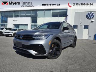 <b>Low Mileage, Sunroof,  Power Liftgate,  Wireless Charging,  Adaptive Cruise Control,  Climate Control!</b><br> <br>  Compare at $39138 - Our Price is just $37998! <br> <br>   Sophisticated yet capable, bold yet stylish, this 2023 Tiguan is the best of both worlds. This  2023 Volkswagen Tiguan is fresh on our lot in Kanata. <br> <br>Whether its a weekend warrior or the daily driver this time, this 2023 Tiguan makes every experience easier to manage. Cutting edge tech, both inside the cabin and under the hood, allow for safe, comfy, and connected rides that keep the whole party going. The crossover of the future is already here, and its called the Tiguan.This low mileage  SUV has just 18,125 kms. Its  pyrite silver metallic in colour  . It has an automatic transmission and is powered by a  184HP 2.0L 4 Cylinder Engine. <br> <br> Our Tiguans trim level is Comfortline R-Line Black Edition. This Tiguan Comfortline R-Line Black Edition features an express open/close sunroof and unique exterior styling, along with a power liftgate, mobile device wireless charging, adaptive cruise control, supportive heated synthetic leather-trimmed front seats, a heated leatherette-wrapped steering wheel, LED headlights with daytime running lights, and an upgraded 8-inch infotainment screen with SiriusXM satellite radio, Apple CarPlay, Android Auto, and a 6-speaker audio system. Additional features include front and rear cupholders, remote keyless entry with power cargo access, lane keep assist, lane departure warning, blind spot detection, front and rear collision mitigation, autonomous emergency braking, three 12-volt DC power outlets, remote start, a rear camera, and so much more. This vehicle has been upgraded with the following features: Sunroof,  Power Liftgate,  Wireless Charging,  Adaptive Cruise Control,  Climate Control,  Heated Seats,  Apple Carplay. <br> <br>To apply right now for financing use this link : <a href=https://www.myersvw.ca/en/form/new/financing-request-step-1/44 target=_blank>https://www.myersvw.ca/en/form/new/financing-request-step-1/44</a><br><br> <br/><br>Backed by Myers Exclusive NO Charge Engine/Transmission for life program lends itself for your peace of mind and you can buy with confidence. Call one of our experienced Sales Representatives today and book your very own test drive! Why buy from us? Move with the Myers Automotive Group since 1942! We take all trade-ins - Appraisers on site - Full safety inspection including e-testing and professional detailing prior delivery! Every vehicle comes with a free Car Proof History report.<br><br>*LIFETIME ENGINE TRANSMISSION WARRANTY NOT AVAILABLE ON VEHICLES MARKED AS-IS, VEHICLES WITH KMS EXCEEDING 140,000KM, VEHICLES 8 YEARS & OLDER, OR HIGHLINE BRAND VEHICLES (eg.BMW, INFINITI, CADILLAC, LEXUS...). FINANCING OPTIONS NOT AVAILABLE ON VEHICLES MARKED AS-IS OR AS-TRADED.<br> Come by and check out our fleet of 40+ used cars and trucks and 120+ new cars and trucks for sale in Kanata.  o~o