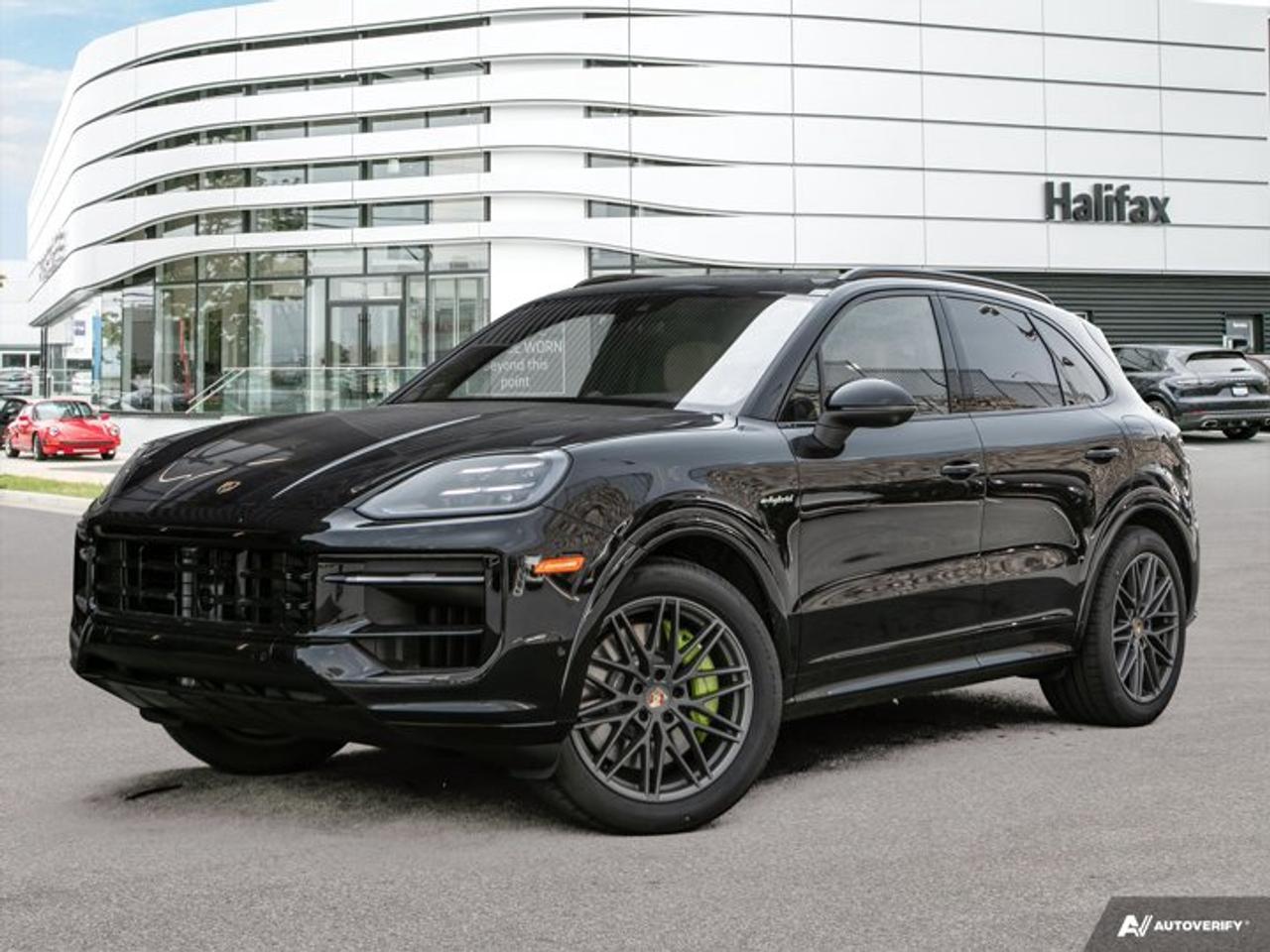 *Now available at Porsche of Halifax*, this *2024 Cayenne E-Hybrid* offers the perfect blend of Porsche performance, plug-in hybrid efficiency, and premium SUV versatility. Finished in *Chromite Black Metallic* with a *Black/Mojave Beige Leather Interior*, it delivers sophistication and capability in equal measure.==== Performance & Driving Dynamics ====The Cayenne E-Hybrid pairs electrified efficiency with the dynamic handling Porsche is renowned for.  *   *Adaptive Cruise Control (ACC)* with Lane Keep Assist for confident, relaxed driving  *   *Adaptive Air Suspension with PASM* for a smooth, customizable ride  *   *Sport Tailpipes in Dark Bronze* for a distinctive, performance-oriented touch==== Exterior Highlights ====  *   *SportDesign Package in High Gloss Black* for a refined, athletic look  *   *21 RS Spyder Design Wheels in Vesuvius Grey*  *   *Roof Rails in Black Aluminum Finish*  *   *E-Hybrid Exterior Differentiation in Acid Green* for subtle distinction  *   *Exclusive Design Fuel Cap* and *Under Door Puddle Light Projectors*  *   *Panoramic Roof System* for an open, airy cabin atmosphere==== Interior Comfort & Craftsmanship ====  *   *14-Way Power Seats with Comfort Memory Package*  *   *Ventilated Front Seats* and *Heated Rear Seats*  *   *BOSE® Surround Sound System* for premium audio quality  *   *Ambient Lighting* for a customizable cabin mood  *   *Porsche Crest on Front Headrests*  *   *Interior Accents in Neodyme* for a distinctive finish  *   *Heated GT Sport Steering Wheel in Leather*  *   *Heated Windshield* for added winter convenience==== Technology & Assistance ====  *   *HD-Matrix Design LED Headlights* for optimal visibility  *   *Surround View with Active Parking Support* for easy maneuvering  *   *Preparation for Porsche Dashcam* (Front and Rear)  *   *Trailer Hitch (without tow ball)* for added versatility----------------------------------------The *2024 Cayenne E-Hybrid* in Chromite Black Metallic offers luxury, efficiency, and capability in one exceptional package. *Now at Porsche of Halifax*---contact us today to arrange your personal viewing or test drive.