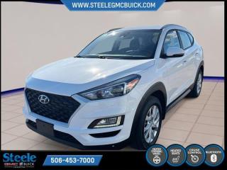 New Price!Dazzling White 2019 Hyundai Tucson Preferred | FOR SALE IN STEELE FREDERCITON | AWD 6-Speed Automatic with Overdrive 2.0L I4 DGI DOHC 16V LEV3-ULEV70 161hp* Market Value Pricing *, AWD, 4-Wheel Disc Brakes, 6 Speakers, ABS brakes, Air Conditioning, Alloy wheels, AM/FM radio, Anti-whiplash front head restraints, AppLink/Apple CarPlay and Android Auto, Brake assist, Bumpers: body-colour, Cloth Seat Trim, Delay-off headlights, Driver door bin, Driver vanity mirror, Dual front impact airbags, Dual front side impact airbags, Electronic Stability Control, Exterior Parking Camera Rear, Four wheel independent suspension, Front anti-roll bar, Front Bucket Seats, Front fog lights, Front reading lights, Heated door mirrors, Heated Front Bucket Seats (3-Steps), Heated front seats, Heated rear seats, Heated steering wheel, Illuminated entry, Leather Shift Knob, Occupant sensing airbag, Outside temperature display, Overhead airbag, Overhead console, Passenger door bin, Passenger vanity mirror, Power door mirrors, Power steering, Power windows, Radio: AM/FM/MP3 Audio System, Rear anti-roll bar, Rear window defroster, Rear window wiper, Remote keyless entry, Roof rack: rails only, Split folding rear seat, Spoiler, Steering wheel mounted audio controls, Tachometer, Telescoping steering wheel, Tilt steering wheel, Traction control, Trip computer, Turn signal indicator mirrors, Variably intermittent wipers.Certification Program Details: 80 Point Inspection Fresh Oil Change Full Vehicle Detail Full tank of Gas 2 Years Fresh MVI Brake through InspectionSteele GMC Buick Fredericton offers the full selection of GMC Trucks including the Canyon, Sierra 1500, Sierra 2500HD & Sierra 3500HD in addition to our other new GMC and new Buick sedans and SUVs. Our Finance Department at Steele GMC Buick are well-versed in dealing with every type of credit situation, including past bankruptcy, so all customers can have confidence when shopping with us!Steele Auto Group is the most diversified group of automobile dealerships in Atlantic Canada, with 47 dealerships selling 27 brands and an employee base of well over 2300.Reviews:* Most owners say this era of Tucson attracted their attention with unique exterior styling, and sealed the deal with a great balance of comfortable ride quality and sporty, spirited driving dynamics. Bang-for-the-buck was highly rated as well. Source: autoTRADER.ca