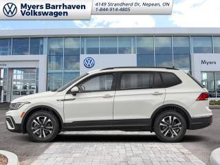 <b>Low Mileage, Power Liftgate,  Wireless Charging,  Adaptive Cruise Control,  Climate Control,  Heated Seats!</b><br> <br>    The VW Tiguan aces real-world utility with its excellent outward vision, comfortable interior, and supreme on road capabilities. This  2023 Volkswagen Tiguan is fresh on our lot in Nepean. <br> <br>Whether its a weekend warrior or the daily driver this time, this 2023 Tiguan makes every experience easier to manage. Cutting edge tech, both inside the cabin and under the hood, allow for safe, comfy, and connected rides that keep the whole party going. The crossover of the future is already here, and its called the Tiguan.This low mileage  SUV has just 7,719 kms. Its  pure white in colour  . It has an automatic transmission and is powered by a  184HP 2.0L 4 Cylinder Engine. <br> <br> Our Tiguans trim level is Comfortline. Stepping up to this Tiguan Comfortline rewards you with a power liftgate, mobile device wireless charging, adaptive cruise control, supportive heated synthetic leather-trimmed front seats, a heated leatherette-wrapped steering wheel, LED headlights with daytime running lights, and an upgraded 8-inch infotainment screen with SiriusXM satellite radio, Apple CarPlay, Android Auto, and a 6-speaker audio system. Additional features include front and rear cupholders, remote keyless entry with power cargo access, lane keep assist, lane departure warning, blind spot detection, front and rear collision mitigation, autonomous emergency braking, three 12-volt DC power outlets, remote start, a rear camera, and so much more. This vehicle has been upgraded with the following features: Power Liftgate,  Wireless Charging,  Adaptive Cruise Control,  Climate Control,  Heated Seats,  Apple Carplay,  Android Auto. <br> <br>To apply right now for financing use this link : <a href=https://www.barrhavenvw.ca/en/form/new/financing-request-step-1/44 target=_blank>https://www.barrhavenvw.ca/en/form/new/financing-request-step-1/44</a><br><br> <br/><br>We are your premier Volkswagen dealership in the region. If youre looking for a new Volkswagen or a car, check out Barrhaven Volkswagens new, pre-owned, and certified pre-owned Volkswagen inventories. We have the complete lineup of new Volkswagen vehicles in stock like the GTI, Golf R, Jetta, Tiguan, Atlas Cross Sport, Volkswagen ID.4 electric vehicle, and Atlas. If you cant find the Volkswagen model youre looking for in the colour that you want, feel free to contact us and well be happy to find it for you. If youre in the market for pre-owned cars, make sure you check out our inventory. If you see a car that you like, contact 844-914-4805 to schedule a test drive.<br> Come by and check out our fleet of 30+ used cars and trucks and 70+ new cars and trucks for sale in Nepean.  o~o