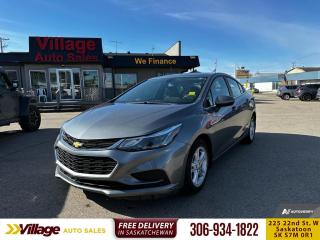 <b>Heated Seats,  Aluminum Wheels,  LED Lights,  Apple CarPlay,  Android Auto!</b><br> <br> We sell high quality used cars, trucks, vans, and SUVs in Saskatoon and surrounding area.<br> <br>   With its accommodating cabin and strong engine, this 2018 Chevrolet Cruze is a top recommendation in the compact car segment. This  2018 Chevrolet Cruze is for sale today. <br> <br>Whether youre zipping around city streets or navigating winding roads, this 2018 Chevy Cruze is made to work hard for you and look good doing it. With a unique combination of high-tech entertainment, remarkable efficiency and advanced safety features, this sporty compact car helps you get where youre going without missing a beat. This  sedan has 134,906 kms. Its  grey in colour  . It has a 6 speed automatic transmission and is powered by a  153HP 1.4L 4 Cylinder Engine.  It may have some remaining factory warranty, please check with dealer for details. <br> <br> Our Cruzes trim level is LT. Upgrading to this Chevrolet Cruze LT is a great choice as it comes with a long list of extra features like aluminum wheels, signature LED lights and heated seats, a 7 inch touchscreen display plus Android Auto and Apple CarPlay capability, a rear vision camera, 4G LTE and available built-in Wi-Fi hotspot. It also includes teen driver technology, a 6-speaker audio system with Chevrolet MyLink and SiriusXM, air conditioning, remote keyless entry, power windows, a 60/40 split-folding rear seat and a total of 10 airbags. This vehicle has been upgraded with the following features: Heated Seats,  Aluminum Wheels,  Led Lights,  Apple Carplay,  Android Auto,  Rear View Camera,  Cruise Control. <br> <br>To apply right now for financing use this link : <a href=https://www.villageauto.ca/car-loan/ target=_blank>https://www.villageauto.ca/car-loan/</a><br><br> <br/><br> Buy this vehicle now for the lowest bi-weekly payment of <b>$107.69</b> with $0 down for 84 months @ 5.99% APR O.A.C. ( Plus applicable taxes -  Plus applicable fees   ).  See dealer for details. <br> <br><br> Village Auto Sales has been a trusted name in the Automotive industry for over 40 years. We have built our reputation on trust and quality service. With long standing relationships with our customers, you can trust us for advice and assistance on all your motoring needs. </br>

<br> With our Credit Repair program, and over 250 well-priced vehicles in stock, youll drive home happy, and thats a promise. We are driven to ensure the best in customer satisfaction and look forward working with you. </br> o~o