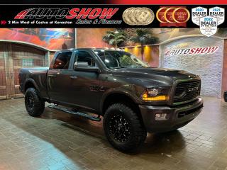 <strong>*** LOADED RAM 3500 CUMMINS LARAMIE! *** AISIN TRANSMISSION, SUNROOF, HEATED/COOLED LEATHER, HEATED WHEEL!! *** BUCKETS & CONSOLE, ALPINE STEREO, TONNEAU, BEDLINER!! *** </strong>Talk about a truck!! This rig had an <strong>MSRP </strong>of <strong>OVER $90,000.00!! </strong>Over <b>$25,000.00 IN FACTORY UPGRADES </b>& accessories over and above the already-loaded Laramie Trim!! <strong>NEW BRAKES </strong>all around......Power <strong>SUNROOF</strong>......Black <strong>LEATHER INTERIOR</strong>......<strong>NAVIGATION </strong>Package......<strong>HEATED SEATS</strong>......<strong>A/C VENTILATED SEATS</strong>......<strong>HEATED STEERING WHEEL</strong>......Sport <strong>BUCKETS & CONSOLE</strong>......<strong>ALPINE PREMIUM STEREO</strong>......Dual <strong>POWER ADJUSTABLE SEATS </strong>w/ Lumbar Support......Power Folding Mirrors......New Enthuze <strong>TONNEAU COVER</strong>.......Spray-In <strong>BEDLINER</strong>......Power Adjustable Pedals......Leather Wheel w/ Media & Cruise Controls......Digital VIC (Vehicle Information Center)......Push Button Ignition......<strong>WI-FI HOTSPOT</strong>......<strong>RUNNING BOARDS</strong>......Sport Colour-Matched Grille, Bumpers, Handles......Blackout Badges......Power <strong>REAR SLIDING WINDOW</strong>......Dual Zone Climate Control......<strong>LED </strong>Lights......<strong>HID </strong>Projector Headlights......Fog Lights......<strong>TOW PACKAGE </strong>w/ 4-Pin & 7-Pin Connectors......Tow/Haul Mode......Exhaust Brake (Jake Brake)......<strong>FIFTH WHEEL PREP</strong>......Electronic Shift on the Fly <strong>4X4/4WD </strong>w/ Low & Lock......Powerful <strong>6.7L DIESEL I6 ENGINE</strong>......<strong>AISIN HD </strong>Automatic Transmission......Optional <strong>18 INCH FUEL ALLOY RIMS </strong>w/ <strong>37 X 12.5 TERRA RAIDER A/T TIRES!!</strong><br /><br />PLEASE NOTE: AFTERMARKET WHEEL & TIRE PACKAGE (PICTURED) IS AVAILABLE AT AN ADDED COST, ADVERTISED PRICE INCLUDES FACTORY SET.<br /><br />This Loaded Laramie Cummins comes with all original Books & Manuals, two sets of Keys & Fobs, and Fitted All Weather Mats. 252,000kms, now sale priced at just $48,800 with Financing available!!<br /><br /><br />Will accept trades. Please call (204)560-6287 or View at 3165 McGillivray Blvd. (Conveniently located two minutes West from Costco at corner of Kenaston and McGillivray Blvd.)<br /><br />In addition to this please view our complete inventory of used <a href=\https://www.autoshowwinnipeg.com/used-trucks-winnipeg/\>trucks</a>, used <a href=\https://www.autoshowwinnipeg.com/used-cars-winnipeg/\>SUVs</a>, used <a href=\https://www.autoshowwinnipeg.com/used-cars-winnipeg/\>Vans</a>, used <a href=\https://www.autoshowwinnipeg.com/new-used-rvs-winnipeg/\>RVs</a>, and used <a href=\https://www.autoshowwinnipeg.com/used-cars-winnipeg/\>Cars</a> in Winnipeg on our website: <a href=\https://www.autoshowwinnipeg.com/\>WWW.AUTOSHOWWINNIPEG.COM</a><br /><br />Complete comprehensive warranty is available for this vehicle. Please ask for warranty option details. All advertised prices and payments plus taxes (where applicable).<br /><br />Winnipeg, MB - Manitoba Dealer Permit # 4908