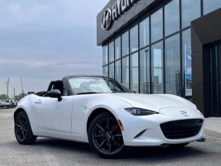 <b>Low Mileage, Navigation,  Heated Seats,  Mazda Connect,  Aluminum Wheels,  Sport Suspension!</b><br> <br>  Compare at $32950 - Our Price is just $31990! <br> <br>   Lighter, faster and simply beautiful. The Mazda MX 5 is truly one of a kind. This  2018 Mazda MX-5 is for sale today in Midland. <br> <br>Reinvented with the renowned spirit of motion design that is Mazdas signature way of designing beautiful vehicles, the 2018 Mazda MX 5 is lighter, faster and inexplicably beautiful from every angle. This historic model is back with a more powerful engine and improved on road performances giving you the thrill of a lifetime as you cruse the open road.This low mileage  convertible has just 30,451 kms. Its  snowflake white pearl mica in colour  . It has a 6 speed automatic transmission and is powered by a  155HP 2.0L 4 Cylinder Engine.  It may have some remaining factory warranty, please check with dealer for details. <br> <br> Our MX-5s trim level is GS. Jumping into the GS trim, you get a host of standard features such as a leather-wrapped sport steering wheel, a seven-inch colour touchscreen with built in navigation, MAZDA CONNECT with Bluetooth, a sport tuned suspension with Bilstein shocks and a performance limited slip differential, heated power side mirrors, heated seats with red accent stitching and advanced blind spot monitoring. You will also get aluminum wheels, rear cross traffic alert, cruise control, a proximity key with push button start and a 6 speaker audio system. This vehicle has been upgraded with the following features: Navigation,  Heated Seats,  Mazda Connect,  Aluminum Wheels,  Sport Suspension,  Remote Keyless Entry,  Blind Spot Monitoring. <br> <br>To apply right now for financing use this link : <a href=https://www.bourgeoishyundai.com/finance/ target=_blank>https://www.bourgeoishyundai.com/finance/</a><br><br> <br/><br>BUY WITH CONFIDENCE. Bourgeois Auto Group, we dont just sell cars; for over 75 years, we have delivered extraordinary automotive experiences in every showroom, on the road, and at your home. Offering complimentary delivery in an enclosed trailer. <br><br>Why buy from the Bourgeois Auto Group? Whether you are looking for a great place to buy your next new or used vehicle find a qualified repair center or looking for parts for your vehicle the Bourgeois Auto Group has the answer. We offer both new vehicles and pre-owned vehicles with over 25 brand manufacturers and over 200 Pre-owned Vehicles to choose from. Were constantly changing to meet the needs of our customers and stay ahead of the competition, and we are committed to investing in modern technology to ensure that we are always on the cutting edge. We use very strategic programs and tools that give us current market data to price our vehicles to the market to make sure that our customers are getting the best deal not only on the new car but on your trade-in as well. Ask for your free Live Market analysis report and save time and money. <br><br>WE BUY CARS  Any make model or condition, No purchase necessary. We are OPEN 24 hours a Day/7 Days a week with our online showroom and chat service. Our market value pricing provides the most competitive prices on all our pre-owned vehicles all the time. Market Value Pricing is achieved by polling over 20000 pre-owned websites every day to ensure that every single customer receives real-time Market Value Pricing on every pre-owned vehicle we sell. Customer service is our top priority. No hidden costs or fees, and full disclosure on all services and Carfax®. <br><br>With over 23 brands and over 400 full- and part-time employees, we look forward to serving all your automotive needs! <br> Come by and check out our fleet of 40+ used cars and trucks and 40+ new cars and trucks for sale in Midland.  o~o