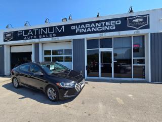 <p>?? Rev up your engines and buckle in for a ride because weve got a sleek 2018 Hyundai Elantra GL/SEL waiting just for you! This beauty isnt just a car; its your ultimate road companion, blending style, performance, and comfort into one irresistible package.</p>

<p>Lets talk tech  the Elantra comes packed with all the bells and whistles you need to rule the road. From its responsive touchscreen infotainment system to its intuitive smartphone integration, staying connected has never been easier. And with its advanced safety features like blind-spot monitoring and lane-keep assist, you can cruise with peace of mind knowing youre always protected.</p>

<p>But wait, theres more! Under the hood, youll find a zippy yet fuel-efficient engine thats ready to take on whatever the road throws your way. Whether youre navigating city streets or hitting the open highway, the Elantras dynamic performance will keep you smiling mile after mile.</p>

<p>And lets not forget about comfort  because lets face it, a car is your second home. With its spacious interior and plush seating, the Elantra invites you to relax and enjoy the journey. So go ahead, stretch out those legs and crank up the tunes as you glide down the road in style.</p>

<p>But dont just take our word for it  come see for yourself why the 2018 Hyundai Elantra GL/SEL is the ultimate choice for drivers who demand the best. Schedule your test drive today and experience the thrill of driving excellence!</p>

<p><em>Disclaimer: All facts and features mentioned are based on available information at the time of writing. Please consult with our sales team for the most up-to-date details.</em></p>

<p><em> Inquire for details @ 613-561-4857 (Call or Text) or Drop by the office @ 2212 Princess St, Kingston, Ontario - Platinum Auto Sales, Proudly Serving Kingston at our New Convenient Location to help serve you better!<br />
 Are you making payments for a vehicle you no longer want or need? We can get you out of that car and into a car you love.<br />
 Have you been to other dealerships and declined for a vehicle? We finance ALL credit situations and income types: Full time, Part time, Pension, Old Age Security, ODSP, Ontario Works, Child Tax and even Cash Income. Good credit, bad credit, no credit? Bankruptcy or Consumer Proposal? Your approved!<br />
 Top Tier Extended Warranty & Gap Insurance Protection Packages! Come see the Platinum team and let us take the stress out of buying your next car.<br />
 Platinum Auto Sales Kingston - Call or Txt 613-561-4857 Come into the office at 2212 Princess St, Kingston The Home of Guaranteed Financing **(O.A.C. and/or down payment may be required).<br />
$699 Certification Fee Includes 30 Day Guarantee, inquire for details. <br />
 If opting to not purchase certified, please consider the following *This Vehicle is not driveable and not certified, Certification is available for $699, which also includes 30 day/1000km guarantee, in which case the vehicle is then Fit and Driveable, inquire for details.<br />
 Please contact a sales representative to ensure options are exactly as stated. It is rare but sometimes the vin decoder makes errors.</em><br />
</p>