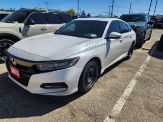 Platinum White Pearl 2020 Honda Accord Sport 2.0T 4D Sedan I4 DOHC 16V Turbocharged 10-Speed Automatic FWD Black w/Leather-Trimmed Seats, 10 Speakers, 19 Aluminum-Alloy Wheels, 4-Wheel Disc Brakes, ABS brakes, Air Conditioning, Alloy wheels, AM/FM radio, Apple CarPlay/Android Auto, Auto High-beam Headlights, Automatic temperature control, Brake assist, Bumpers: body-colour, Compass, Delay-off headlights, Driver door bin, Driver vanity mirror, Dual front impact airbags, Dual front side impact airbags, Electronic Stability Control, Emergency communication system: HondaLink, Exterior Parking Camera Rear, Forward collision: Collision Mitigation Braking System (CMBS) + FCW mitigation, Four wheel independent suspension, Front anti-roll bar, Front Bucket Seats, Front dual zone A/C, Front fog lights, Front reading lights, Fully automatic headlights, Heated door mirrors, Heated Front Bucket Seats, Heated front seats, Illuminated entry, Knee airbag, Lane departure: Lane Keeping Assist System (LKAS) active, Leather steering wheel, Leather/Fabric Combination Seat Trim, Low tire pressure warning, Occupant sensing airbag, Outside temperature display, Overhead airbag, Overhead console, Panic alarm, Passenger door bin, Passenger vanity mirror, Power door mirrors, Power driver seat, Power moonroof, Power steering, Power windows, Radio data system, Radio: 452-Watt AM/FM Premium Audio System, Rear anti-roll bar, Rear window defroster, Remote keyless entry, Security system, Speed control, Speed-sensing steering, Speed-Sensitive Wipers, Split folding rear seat, Spoiler, Steering wheel mounted audio controls, Tachometer, Telescoping steering wheel, Tilt steering wheel, Traction control, Trip computer, Turn signal indicator mirrors, Variably intermittent wipers.

Awards:
  * ALG Canada Residual Value Awards, Residual Value Awards   * ALG Canada Residual Value Awards

Reviews:
  * Owners rave about easy-to-use tech, powerful LED headlights, a ride that nicely balances comfort against responsive handling, and powertrains that are refined and rich with low-end torque response for more pleasing power delivery. Plenty of storage space for smaller items, and a nicely finished look and feel to many of the smaller on-board controls rounds out the package. Generous rear-seat legroom is also noted. Source: autoTRADER.ca