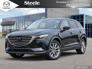 Recent Arrival!Odometer is 10650 kilometers below market average!Jet Black Mica 2021 Mazda CX-9 GS AWD6-Speed Automatic I4 Turbo**FAIR MARKET PRICING**, AWD, 4-Wheel Disc Brakes, Active Cruise Control, AppLink/Apple CarPlay and Android Auto, Auto High-beam Headlights, Auto-dimming Rear-View mirror, Automatic temperature control, Exterior Parking Camera Rear, Four wheel independent suspension, Front dual zone A/C, Front fog lights, Fully automatic headlights, Heated door mirrors, Heated Front Bucket Seats, Heated rear seats, Heated steering wheel, Leather Upholstery, Power driver seat, Power Liftgate, Power moonroof, Power passenger seat, Radio: AM/FM/HD w/6 Speakers, Rain sensing wipers, Rear air conditioning, Remote keyless entry, Wheels: 20 Silver Alloy.Why Buy From Us? - Fair Market Pricing - No Pressure Environment - State Of the Art Facility - Certified Technicians.If you are in the market for a quality used car, used truck or used minivan please take a moment and search our collective inventory located at our dealerships. Our goal is to deliver the best possible service to you. We are united by one passion: To help you find the vehicle that is right for you, and for wherever the roads you travel take you. Simply put, we work hard to earn your trust, and even harder to keep it, always going the extra mile to serve you. See why our customers say that, when it comes to choosing a vehicle, the Steele Auto Group makes it easy!.