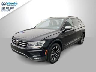Step into sophistication with the Tiguan Comfortlines elegant exterior and refined interior. Its dynamic lines and bold grille command attention on the road, while the spacious cabin offers luxurious comfort for every passenger.