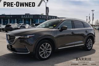 <p>Embark on a journey filled with excitement and luxury with the 2018 Mazda CX-9 GT AWD. This exceptional SUV offers a perfect blend of performance, comfort, and style, making every drive an unforgettable experience.</p>

<p><strong>Performance:</strong></p>

<p>Powered by a responsive 2.5L 4-cylinder engine paired with a smooth 6-speed automatic transmission, the CX-9 GT AWD delivers impressive power and efficiency. With its all-wheel-drive capability, this SUV ensures confident handling and traction on any road surface, whether youre navigating city streets or venturing off the beaten path.</p>

<p><strong>Interior:</strong></p>

<p>Step inside the spacious and refined cabin of the CX-9 GT AWD, where comfort and sophistication harmonize seamlessly. Luxurious amenities such as premium materials, heated leather seats, and tri-zone automatic climate control create an inviting atmosphere for both driver and passengers. With advanced technology features including a touchscreen infotainment system, Bluetooth connectivity, and available navigation, every journey is enhanced with convenience and entertainment.</p>

<p><strong>Safety:</strong></p>

<p>Safety is paramount in the Mazda CX-9 GT AWD, with a suite of advanced safety features designed to provide peace of mind on every drive. From the comprehensive i-ACTIVSENSE safety suite, including features like adaptive cruise control, blind-spot monitoring, lane departure warning, and more, to standard safety equipment like airbags and stability control, this SUV prioritizes your well-being and that of your passengers.</p>

<p><strong>Exterior:</strong></p>

<p>Adorned with sleek lines, bold contours, and striking LED lighting, the exterior of the CX-9 GT AWD commands attention wherever it goes. Available in a range of eye-catching colors, this SUV exudes elegance and sophistication from every angle, making a lasting impression on the road.</p>

<p>Experience the perfect balance of performance, luxury, and safety with the 2018 Mazda CX-9 GT AWD. Whether youre embarking on a family adventure or simply commuting through the city, this exceptional SUV is equipped to elevate your driving experience to new heights. Dont miss your chance to explore all that the CX-9 GT AWD has to offervisit us today and take a test drive!</p>