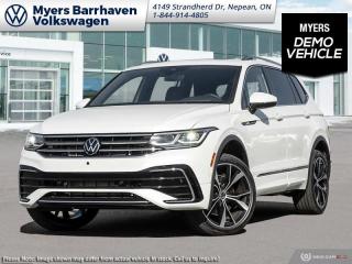 <b>Leather Seats!</b><br> <br> <br> <br>  Everything from capacity, capability, comfort, and ease of use was designed with relentless purpose on this 2023 Tiguan. <br> <br>Whether its a weekend warrior or the daily driver this time, this 2024 Tiguan makes every experience easier to manage. Cutting edge tech, both inside the cabin and under the hood, allow for safe, comfy, and connected rides that keep the whole party going. The crossover of the future is already here, and its called the Tiguan.<br> <br> This oryx white pearl effect SUV  has an automatic transmission and is powered by a  2.0L I4 16V GDI DOHC Turbo engine.<br> <br> Our Tiguans trim level is Highline R-Line. This range-topping Tiguan Highline R-Line is fully-loaded with ventilated and heated leather-wrapped seats with power adjustment, lumbar support and memory function, a heated leather-wrapped steering wheel, an 8-speaker Fender audio system with a subwoofer, adaptive cruise control, a 360-camera with aerial view, park distance control with automated parking sensors, and remote engine start. Additional features include an express open/close sunroof with tilt and slide functions and a power sunshade, rain detecting wipers with heated jets, a power liftgate, 4G LTE mobile hotspot internet access, and an 8-inch infotainment screen with satellite navigation, wireless Apple CarPlay and Android Auto, and SiriusXM streaming radio. Safety features also include blind spot detection, lane keep assist, lane departure warning, VW Car-Net Safe & Secure, forward and rear collision mitigation, and autonomous emergency braking. This vehicle has been upgraded with the following features: Leather Seats.  This is a demonstrator vehicle driven by a member of our staff, so we can offer a great deal on it.<br><br> <br>To apply right now for financing use this link : <a href=https://www.barrhavenvw.ca/en/form/new/financing-request-step-1/44 target=_blank>https://www.barrhavenvw.ca/en/form/new/financing-request-step-1/44</a><br><br> <br/>    4.99% financing for 84 months. <br> Buy this vehicle now for the lowest bi-weekly payment of <b>$329.57</b> with $0 down for 84 months @ 4.99% APR O.A.C. ( Plus applicable taxes -  $840 Documentation fee. Cash purchase selling price includes: Tire Stewardship ($20.00), OMVIC Fee ($12.50). (HST) are extra. </br>(HST), licence, insurance & registration not included </br>    ).  Incentives expire 2024-07-02.  See dealer for details. <br> <br> <br>LEASING:<br><br>Estimated Lease Payment: $278 bi-weekly <br>Payment based on 3.99% lease financing for 48 months with $0 down payment on approved credit. Total obligation $28,995. Mileage allowance of 16,000 KM/year. Offer expires 2024-07-02.<br><br><br>We are your premier Volkswagen dealership in the region. If youre looking for a new Volkswagen or a car, check out Barrhaven Volkswagens new, pre-owned, and certified pre-owned Volkswagen inventories. We have the complete lineup of new Volkswagen vehicles in stock like the GTI, Golf R, Jetta, Tiguan, Atlas Cross Sport, Volkswagen ID.4 electric vehicle, and Atlas. If you cant find the Volkswagen model youre looking for in the colour that you want, feel free to contact us and well be happy to find it for you. If youre in the market for pre-owned cars, make sure you check out our inventory. If you see a car that you like, contact 844-914-4805 to schedule a test drive.<br> Come by and check out our fleet of 40+ used cars and trucks and 90+ new cars and trucks for sale in Nepean.  o~o