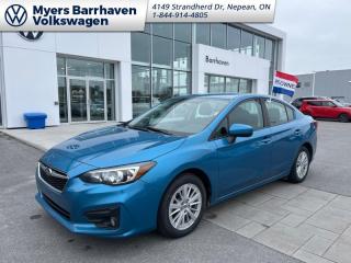 <b>Aluminum Wheels,  Apple CarPlay,  Android Auto,  Touchscreen,  Remote Keyless Entry!</b><br> <br>    Compact in size, huge in style and substance, the 2018 Subaru Impreza is a different kind of compact with standard all-wheel drive. This  2018 Subaru Impreza is fresh on our lot in Nepean. <br> <br>The 2018 Subaru Impreza stands out in a very competitive class. Thats thanks to its standard all-wheel drive and distinct attitude. It meets or exceeds its competitors at just about everything. Generous tech, a comfortable cabin, and a reliable drivetrain make the Impreza a desirable package. For something a little different in the compact class, check out this Subaru Impreza. This  sedan has 143,340 kms. Its  lapis blue in colour  . It has an automatic transmission and is powered by a  152HP 2.0L 4 Cylinder Engine.  <br> <br> Our Imprezas trim level is 4-dr Touring AT. The Touring trim adds some nice features to this Impreza. It includes a backup camera, automatic headlights, aluminum wheels, a leather-wrapped steering wheel, heated front seats, automatic climate control, a 6.5-inch touchscreen infotainment system with Bluetooth, Apple CarPlay, Android Auto, and six-speaker audio, LED taillights, cruise control, and more! This vehicle has been upgraded with the following features: Aluminum Wheels,  Apple Carplay,  Android Auto,  Touchscreen,  Remote Keyless Entry,  Rear View Camera,  Bluetooth. <br> <br>To apply right now for financing use this link : <a href=https://www.barrhavenvw.ca/en/form/new/financing-request-step-1/44 target=_blank>https://www.barrhavenvw.ca/en/form/new/financing-request-step-1/44</a><br><br> <br/><br> Buy this vehicle now for the lowest bi-weekly payment of <b>$114.89</b> with $0 down for 84 months @ 7.99% APR O.A.C. ((Plus applicable taxes and fees - Some conditions apply to get approved at the mentioned rate)     ).  See dealer for details. <br> <br>We are your premier Volkswagen dealership in the region. If youre looking for a new Volkswagen or a car, check out Barrhaven Volkswagens new, pre-owned, and certified pre-owned Volkswagen inventories. We have the complete lineup of new Volkswagen vehicles in stock like the GTI, Golf R, Jetta, Tiguan, Atlas Cross Sport, Volkswagen ID.4 electric vehicle, and Atlas. If you cant find the Volkswagen model youre looking for in the colour that you want, feel free to contact us and well be happy to find it for you. If youre in the market for pre-owned cars, make sure you check out our inventory. If you see a car that you like, contact 844-914-4805 to schedule a test drive.<br> Come by and check out our fleet of 30+ used cars and trucks and 90+ new cars and trucks for sale in Nepean.  o~o