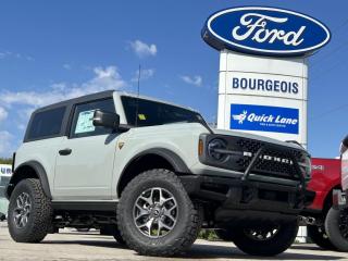 <b>Heated Seats, Ford Co-Pilot360, 360-Degree Camera, Wireless Charging, Navigation!</b><br> <br> <br> <br>  Not only is this 2024 Ford Bronco a cool and capable off-roader, but its also incredibly satisfying to drive every day. <br> <br>With a nostalgia-inducing design along with remarkable on-road driving manners with supreme off-road capability, this 2024 Ford Bronco is indeed a jack of all trades and masters every one of them. Durable build materials and functional engineering coupled with modern day infotainment and driver assistive features ensure that this iconic vehicle takes on whatever you can throw at it. Want an SUV that can genuinely do it all and look good while at it? Look no further than this 2024 Ford Bronco!<br> <br> This cactus grey SUV  has a 7 speed manual transmission and is powered by a  275HP 2.3L 4 Cylinder Engine.<br> <br> Our Broncos trim level is Badlands. Go the distance over any terrain in this Bronco Badlands, with even more undercarriage protection, robust Bilstein shock absorbers, front active anti-roll bars, front and rear tow hooks, and an assortment of upfitter switches. The seats are lined with marine-grade vinyl, with rubber floor covering, for easy rinsing after your intense off-road sessions. Other features include a manual targa composite 1st row sunroof, a manual convertible hard top with fixed rollover protection, a flip-up rear window, LED headlights with automatic high beams, and proximity keyless entry with push button start. Connectivity is handled by an 8-inch LCD screen powered by SYNC 4 with wireless Apple CarPlay and Android Auto, with SiriusXM satellite radio. Additional features include towing equipment including trailer sway control, pre-collision assist with pedestrian detection, forward collision mitigation, a rearview camera, and even more. This vehicle has been upgraded with the following features: Heated Seats, Ford Co-pilot360, 360-degree Camera, Wireless Charging, Navigation, Heated Steering Wheel, 17 Aluminum Wheels. <br><br> View the original window sticker for this vehicle with this url <b><a href=http://www.windowsticker.forddirect.com/windowsticker.pdf?vin=1FMDE9AH6RLA38786 target=_blank>http://www.windowsticker.forddirect.com/windowsticker.pdf?vin=1FMDE9AH6RLA38786</a></b>.<br> <br>To apply right now for financing use this link : <a href=https://www.bourgeoismotors.com/credit-application/ target=_blank>https://www.bourgeoismotors.com/credit-application/</a><br><br> <br/> 7.99% financing for 84 months.  Incentives expire 2024-05-23.  See dealer for details. <br> <br>Discount on vehicle represents the Cash Purchase discount applicable and is inclusive of all non-stackable and stackable cash purchase discounts from Ford of Canada and Bourgeois Motors Ford and is offered in lieu of sub-vented lease or finance rates. To get details on current discounts applicable to this and other vehicles in our inventory for Lease and Finance customer, see a member of our team. </br></br>Discover a pressure-free buying experience at Bourgeois Motors Ford in Midland, Ontario, where integrity and family values drive our 78-year legacy. As a trusted, family-owned and operated dealership, we prioritize your comfort and satisfaction above all else. Our no pressure showroom is lead by a team who is passionate about understanding your needs and preferences. Located on the shores of Georgian Bay, our dealership offers more than just vehiclesits an experience rooted in community, trust and transparency. Trust us to provide personalized service, a diverse range of quality new Ford vehicles, and a seamless journey to finding your perfect car. Join our family at Bourgeois Motors Ford and let us redefine the way you shop for your next vehicle.<br> Come by and check out our fleet of 70+ used cars and trucks and 210+ new cars and trucks for sale in Midland.  o~o
