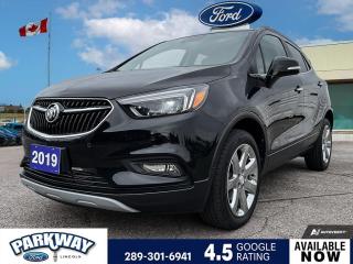 Black Metallic 2019 Buick Encore Essence 4D Sport Utility ECOTEC 1.4L I4 SMPI DOHC Turbocharged VVT 6-Speed Automatic Electronic with Overdrive AWD 3.53 Final Drive Axle Ratio, Air Conditioning, Alloy wheels, AM/FM radio: SiriusXM, Compass, Delay-off headlights, Driver door bin, Driver vanity mirror, Front dual zone A/C, Front fog lights, Fully automatic headlights, Passenger door bin, Passenger vanity mirror, Power driver seat, Power steering, Power Tilt-Sliding Moonroof, Power windows, Rear window defroster, Rear window wiper, Remote keyless entry, Steering wheel mounted audio controls, Trip computer, Variably intermittent wipers.