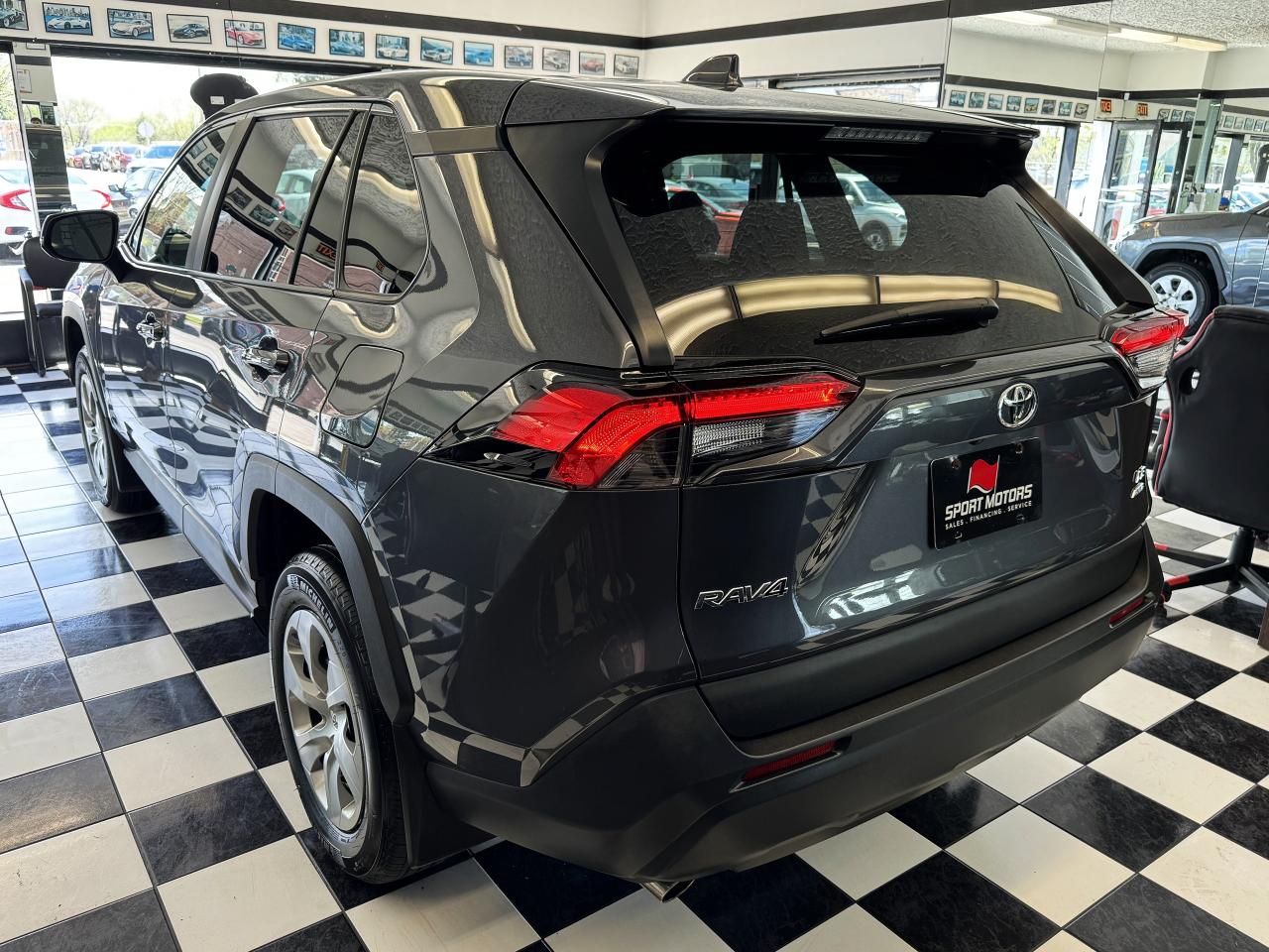 2023 Toyota RAV4 LE AWD+LKA+Adaptive Cruise+ApplePlay+CLEAN CARFAX - Photo #2