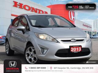 <p><strong>GREAT FIRST CAR!</strong> 2013 Ford Fiesta Titanium featuring automatic transmission, five passenger seating, AM/FM stereo system with USB and auxiliary input, one touch power windows, remote keyless entry, air conditioning, one 12V power outlet, power locks, power and heated mirrors, cruise control, rear door child safety locks, child seat anchors, tire pressure monitoring system, electronic stability control and anti-lock braking system. Contact Cambridge Centre Honda for special discounted finance rates, as low as 8.99% on approved credit.</p>

<p><span style=color:#ff0000><strong>FREE $25 GAS CARD WITH TEST DRIVE!</strong></span></p>

<p>Our philosophy is simple. We believe that buying and owning a car should be easy, enjoyable and transparent. Welcome to the Cambridge Centre Honda Family! Cambridge Centre Honda proudly serves customers from Cambridge, Kitchener, Waterloo, Brantford, Hamilton, Waterford, Brant, Woodstock, Paris, Branchton, Preston, Hespeler, Galt, Puslinch, Morriston, Roseville, Plattsville, New Hamburg, Baden, Tavistock, Stratford, Wellesley, St. Clements, St. Jacobs, Elmira, Breslau, Guelph, Fergus, Elora, Rockwood, Halton Hills, Georgetown, Milton and all across Ontario!</p>