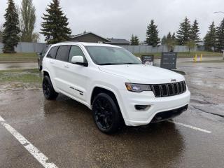 <p>Fully Inspected, ALL Work Complete and Included in Price!  Call Us For More Info at 587-409-5859</p>   <p>The 2017 Jeep Grand Cherokee Limited 75th Anniversary Edition 4X4 in Bright White Clear Coat! Powered by a 3.6 Liter V6 that offers 295hp matched with a responsive 8 Speed Automatic transmission. This Four Wheel Drive provides a best-in-class highway driving range plus shows nearly approximately 9.0L/100km on the highway. The first-class good looks of our Grand Cherokee Limited 75th Anniversary Edition are enhanced by beautiful alloy wheels, a sunroof, and special badging.</p>  <p>Limited 75th Anniversary conveniences such as keyless entry/ignition, full power accessories, dual-zone automatic climate control, a rearview camera, comfortable leather, heated front, and second-row seats, and a heated steering wheel combine to create your daily joyride. Enjoy next-level in-vehicle connectivity thanks to Uconnect Access, a prominent touchscreen, integrated voice command with Bluetooth, available HD/satellite radio, and more!</p>  <p>Whether tackling tough trails or the daily grind, your Jeep will prove to be an excellent companion as it has received excellent safety scores with tire pressure monitoring, traction control, ready alert braking, rearview camera, and park assist. You desire capability, luxury, and comfort, and this Grand Cherokee Limited 75th Anniversary Edition more than delivers! Save this Page and Call for Availability. We Know You Will Enjoy Your Test Drive Towards Ownership!</p>  <p>Call 587-409-5859 for more info or to schedule an appointment! Listed Pricing is valid for 72 hours. Financing is available, please see dealer for term availability and interest rates. AMVIC Licensed Business.</p>