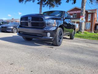 <div>2017 Dodge Ram 1500 Express Edition- This low mileage <b>black beauty</b> is for the serious urban cowboy - flexible duties while catering to the eyes.  Equipped with colour-matching grill, front and rear bumpers, mirrors, door handles and logos and tinted headlights, this Ram is a head turning beast.  With the V8 HEMI under the hood and Dodges legendary ALL-WHEEL DRIVE system, you can go anywhere with room for 5 more passengers. their luggage and their golf clubs.</div><br /><div>Save time,  money and shopping frustration with our transparent, no-hassle pricing. We use state of the art technology to shop the competition for you and price our pre-owned vehicles to give you the best value, upfront, every time and back it up with a free market value report so you know you are getting the best deal! With no additional fees, theres no surprises either, the price you see is the price you pay, just add HST! We offer 150+ Vehicles on site with financing for our customers regardless of credit. We have a dedicated team of credit rebuilding experts on hand to help you get into the car of your dreams. We need your trade-in! We have a hassle free top dollar trade process and offer a free evaluation on your car. We will buy your vehicle even if you do not buy one from us!  THAT CAR PLACE has been in business for 27 years.  We are OMVIC Certified and and are Members of the UCDA earning your trust so you can buy with confidence.  150+ VEHICLES in ONE LOCATION. USED VEHICLE MARKET PRICING! We use an exclusive 3rd party marketing tool that accurately monitor vehicle prices to guarantee our customers get the best value. We implement Zero-Pressure, Hassle-Free sales process.  No hidden Admin Fees. VEHICLE HISTORY: Free Carfax report included with every purchase. AWARDS include National Dealer of the Year Winner of Outstanding Customer Satisfaction.  Voted #1 Best Used Car Dealership in London, Ont. 2014 to 2024.  Winner of Top Choice Award 6 times between the years 2015 and 2024.  Winner of Londons Readers Choice Award 2014 to 2023.  Accredited Better Business Bureau rating.  Each vehicle includes FULL SAFETY: Full safety inspection exceeding industry standards: all vehicles go through an intensive inspection RECONDITIONING. All brake pads or rotors below 50% material are replaced. Each vehicle sold receives a semi-synthetic oil-lube-filter and full detailing and clean up.</div><br /><div><br></div><br /><div>  *Our Staff ensures the accuracy of the information listed above. Please confirm with your sales representative to confirm the accuracy of this information***Payments are based off qualifying monthly term & 4.9% interest. Qualifying term and rate of borrowing varies by lender. Example: The cost of borrowing on a vehicle with a purchase price of $10,000 at 4.9% over 60 month term is $1,499.78. Rates and payments are subject to change without notice.  We have a dedicated team of credit rebuilding experts on hand to help you get into the car of your dreams. We want your trade! We have a hassle free top dollar trade-in process and offer a free evaluation on your car. We will buy your vehicle even if you do not buy one from us! With no additional fees, there are no surprises either - the price you see is the price you pay, just add HST! We offer 150+ Vehicles on site with financing for our customers regardless of credit. We have a dedicated team of credit rebuilding experts on hand to help you get into the car of your dreams. We need your trade-in! We have a hassle free top dollar trade process and offer a free evaluation on your car. We will buy your vehicle even if you do not buy one from us.</div><br /><div><br></div>