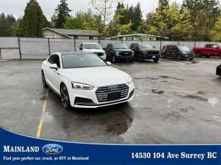 <p><strong><span style=font-family:Arial; font-size:18px;>Drive in Sophistication: 2018 Audi A5 2.0T Progressiv - Luxury Meets Performance at Mainland Ford!

Step into the world of refined elegance with our pre-owned 2018 Audi A5 2.0T Progressiv..</span></strong></p> <p><strong><span style=font-family:Arial; font-size:18px;>With just 84,157 km on the odometer, this sleek coupe blends luxury and technology, making it a top pick for discerning drivers..</span></strong> <br> Equipped with a robust 2.0L 4-cyl engine and a smooth 7-speed automatic transmission, every journey becomes a statement of power and grace.. Ever heard that a car could pamper you? Well, sit back in the heated leather seats and let the Audi A5 prove it! With its state-of-the-art navigation system and a host of driver-assist features like rear parking camera and rain sensing wipers, navigating through busy streets or open highways is as relaxing as a Sunday morning.</p> <p><strong><span style=font-family:Arial; font-size:18px;>Not only does it come with high-end amenities such as a power moonroof, automatic temperature control, and memory seats, but it also ensures your safety with its comprehensive suite of safety features including multiple airbags, electronic stability control, and ABS brakes..</span></strong> <br> Imagine cruising down the road with the heated steering wheel keeping your hands warm while the diversity antenna picks up crystal clear sounds for your listening pleasure.. And with the power passenger seat, inviting someone to join you on your driving adventures is as enticing as the destinations themselves.</p> <p><strong><span style=font-family:Arial; font-size:18px;>At Mainland Ford, we speak your language! We understand that buying a pre-owned vehicle is a significant decision..</span></strong> <br> Thats why we ensure our vehicles are thoroughly inspected and ready to provide a luxurious driving experience.. Dont just take our word for it, come and see for yourself why this Audi A5 isnt just a car, but a partner in your daily adventures.</p> <p><strong><span style=font-family:Arial; font-size:18px;>Visit us at Mainland Ford, where sophistication meets the road in the form of the 2018 Audi A5 2.0T Progressiv..</span></strong> <br> Your dream car awaits!</p><hr />
<p><br />
<br />
To apply right now for financing use this link:<br />
<a href=https://www.mainlandford.com/credit-application/>https://www.mainlandford.com/credit-application</a><br />
<br />
Looking for a new set of wheels? At Mainland Ford, all of our pre-owned vehicles are Mainland Ford Certified. Every pre-owned vehicle goes through a rigorous 96-point comprehensive safety inspection, mechanical reconditioning, up-to-date service including oil change and professional detailing. If that isnt enough, we also include a complimentary Carfax report, minimum 3-month / 2,500 km Powertrain Warranty and a 30-day no-hassle exchange privilege. Now that is peace of mind. Buy with confidence here at Mainland Ford!<br />
<br />
Book your test drive today! Mainland Ford prides itself on offering the best customer service. We also service all makes and models in our World Class service center. Come down to Mainland Ford, proud member of the Trotman Auto Group, located at 14530 104 Ave in Surrey for a test drive, and discover the difference!<br />
<br />
*** All pre-owned vehicle sales are subject to a $699 documentation fee, $149 Fuel / E-Fill Surcharge, $599 Safety and Convenience Fee and $500 Finance Placement Fee (if applicable) plus applicable taxes. ***<br />
<br />
VSA Dealer# 40139</p>

<p>*All prices plus applicable taxes, applicable environmental recovery charges, documentation of $599 and full tank of fuel surcharge of $76 if a full tank is chosen. <br />Other protection items available that are not included in the above price:<br />Tire & Rim Protection and Key fob insurance starting from $599<br />Service contracts (extended warranties) for coverage up to 7 years and 200,000 kms starting from $599<br />Custom vehicle accessory packages, mudflaps and deflectors, tire and rim packages, lift kits, exhaust kits and tonneau covers, canopies and much more that can be added to your payment at time of purchase<br />Undercoating, rust modules, and full protection packages starting from $199<br />Financing Fee of $500 when applicable<br />Flexible life, disability and critical illness insurances to protect portions of or the entire length of vehicle loan</p>